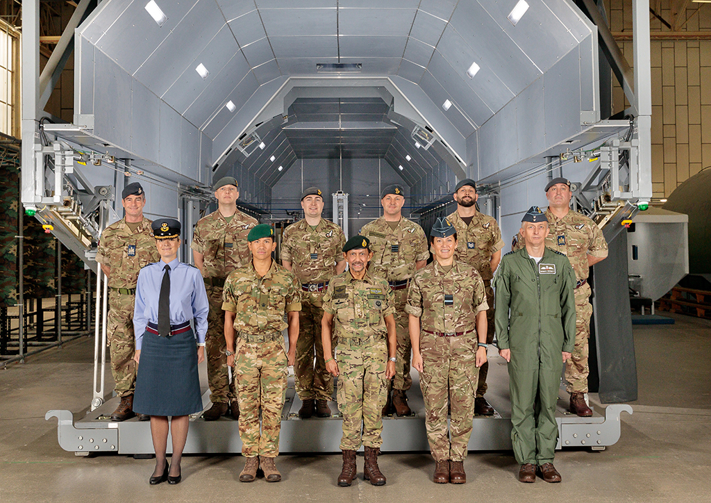 Centre, His Majesty The Sultan of Brunei flanked to his right by His Royal Highness Prince Abdul Mateen and Group Captain Claire O’Grady, and to his left by Air Vice Marshal Suraya Marshall, Group Captain Gareth Burdett, with Parachute Training Squadron members to the rear
