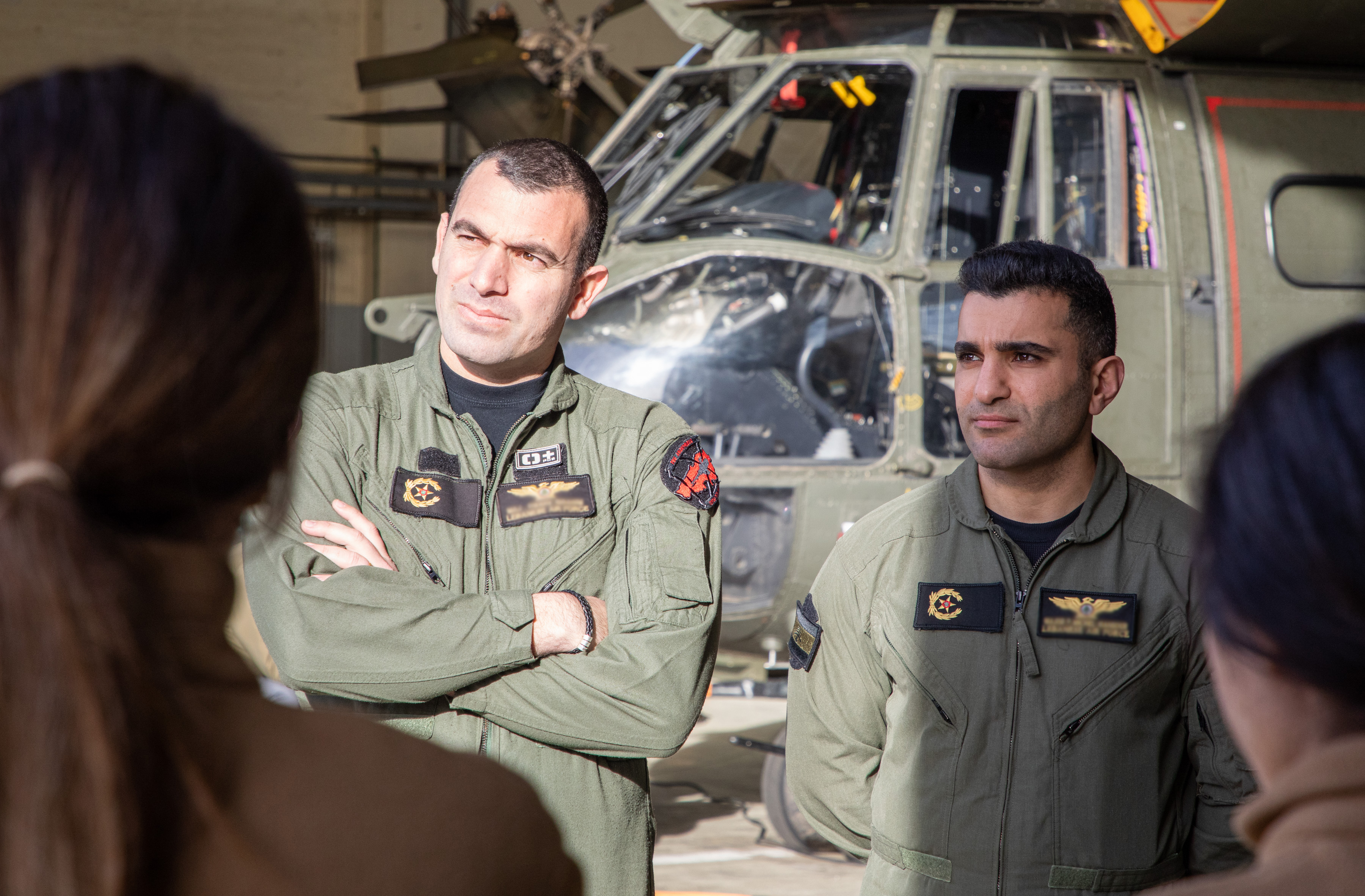 Aircrew from the Lebanese Armed Forces discuss training with the RAF Puma Force