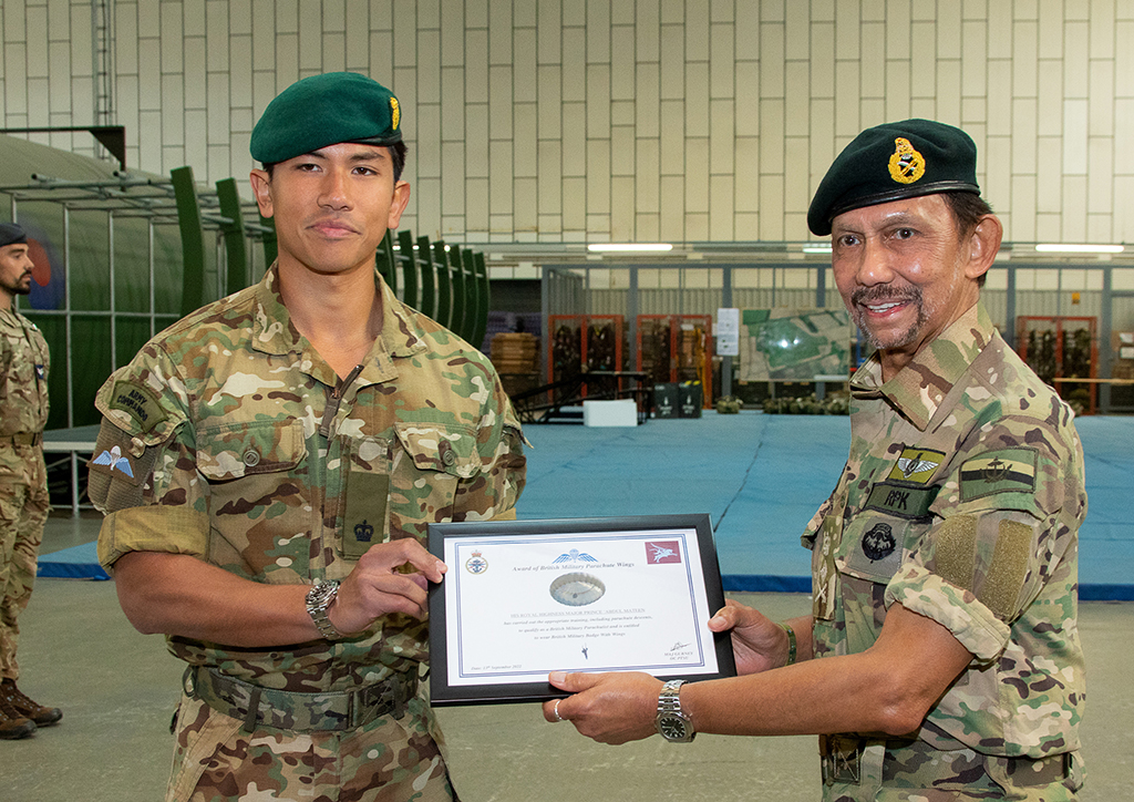 His Majesty The Sultan of Brunei presents to his son, His Royal Highness Prince Abdul Mateen, his course certificate