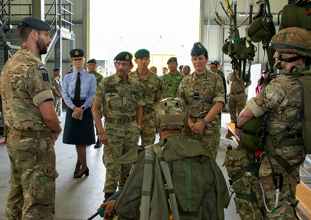 His Majesty The Sultan of Brunei with his son during a tour of Parachute Training Squadron