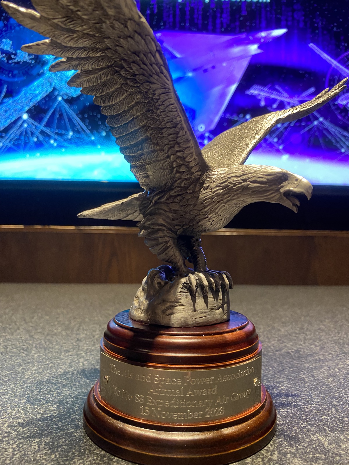 The trophy for the award, depicting an eagle about to take flight