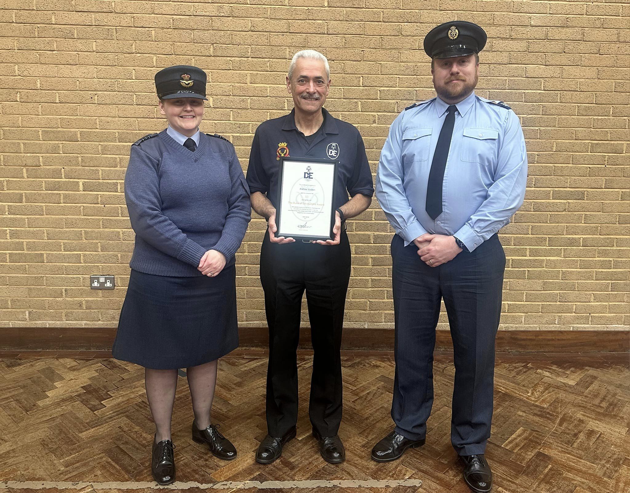Andy been presented with his certificate by Sector Commander, Squadron Leader Kara Oliver, and the Wing Duke of Edinburgh Award Officer, Sergeant John Oliver.