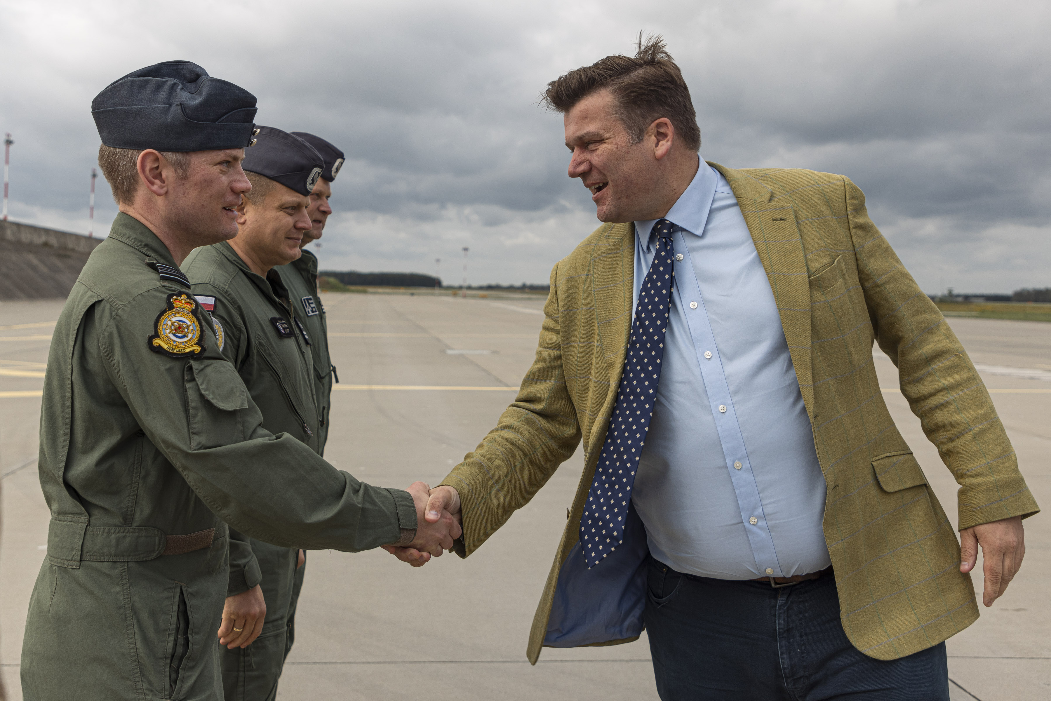James Heappey shaking hands with RAF pilots on the runway