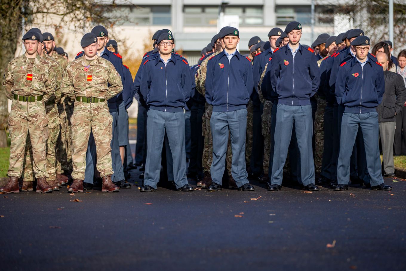 Men in uniform stood during a remembrance parade