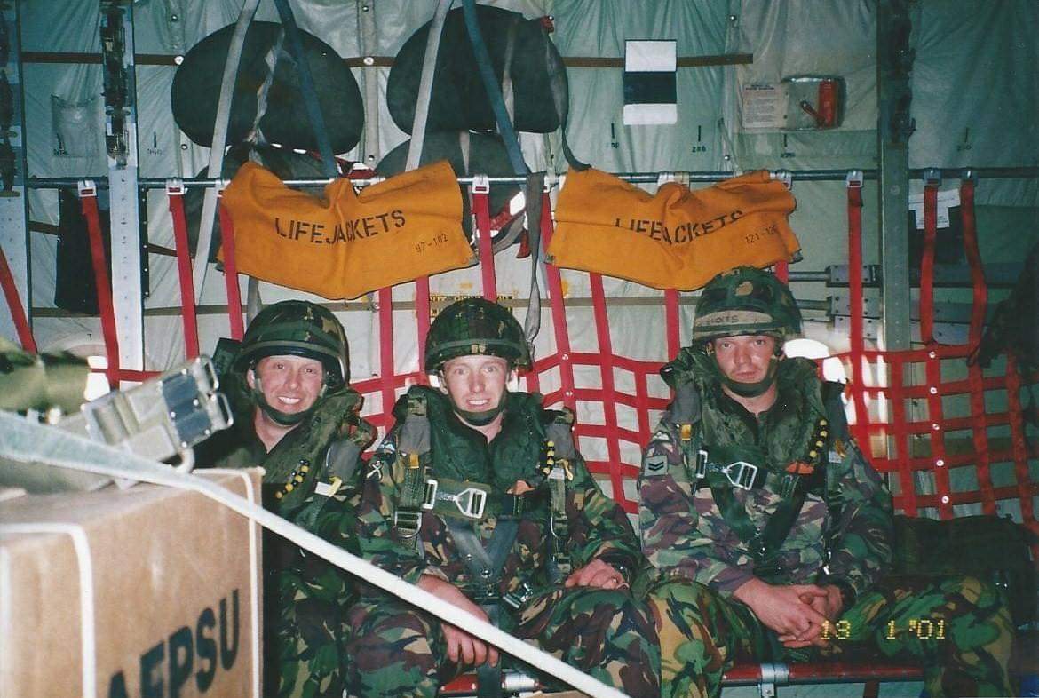 Image shows two members of II Squadron RAF Regiment in the back of the Hercules aircraft.