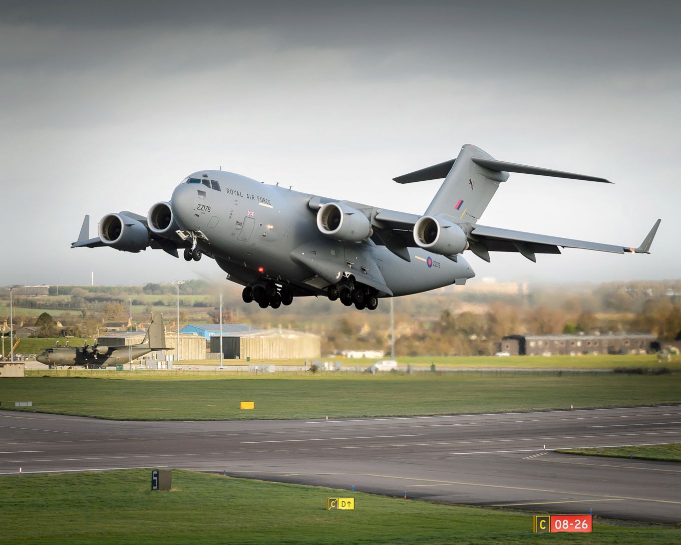Image shows an RAF C-17 aircraft taking off.