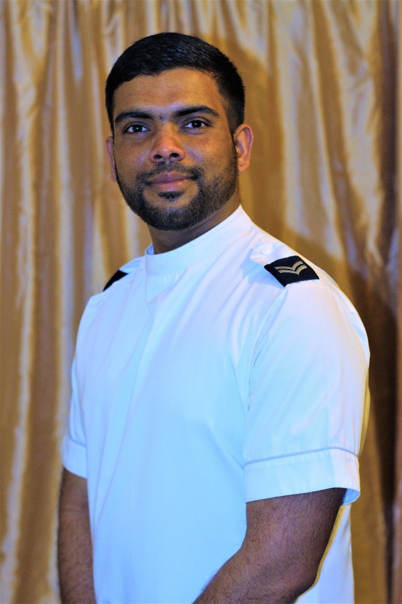 Corporal Faisal standing for a portrait.
