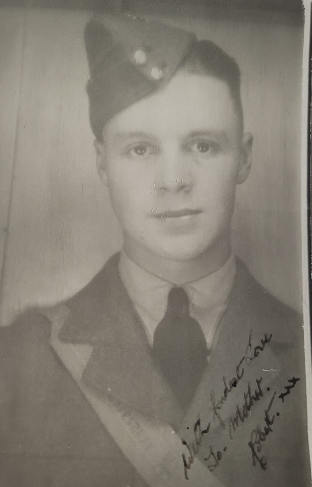 Image shows a black and white portrait photo of Captain Stewart's grandfather when he was younger.