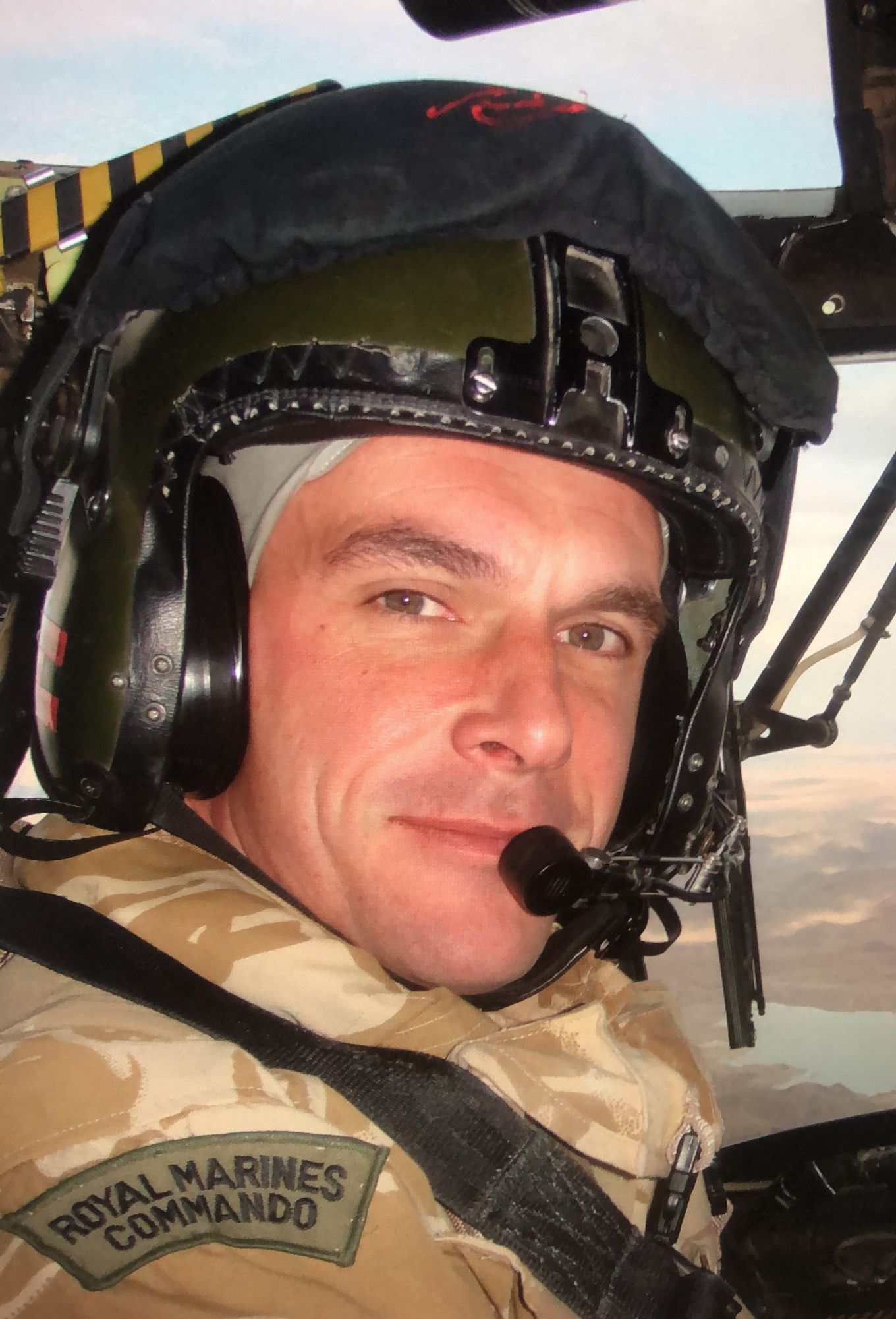 Mark Hammond at the controls of a helicopter in his Royal Marine days