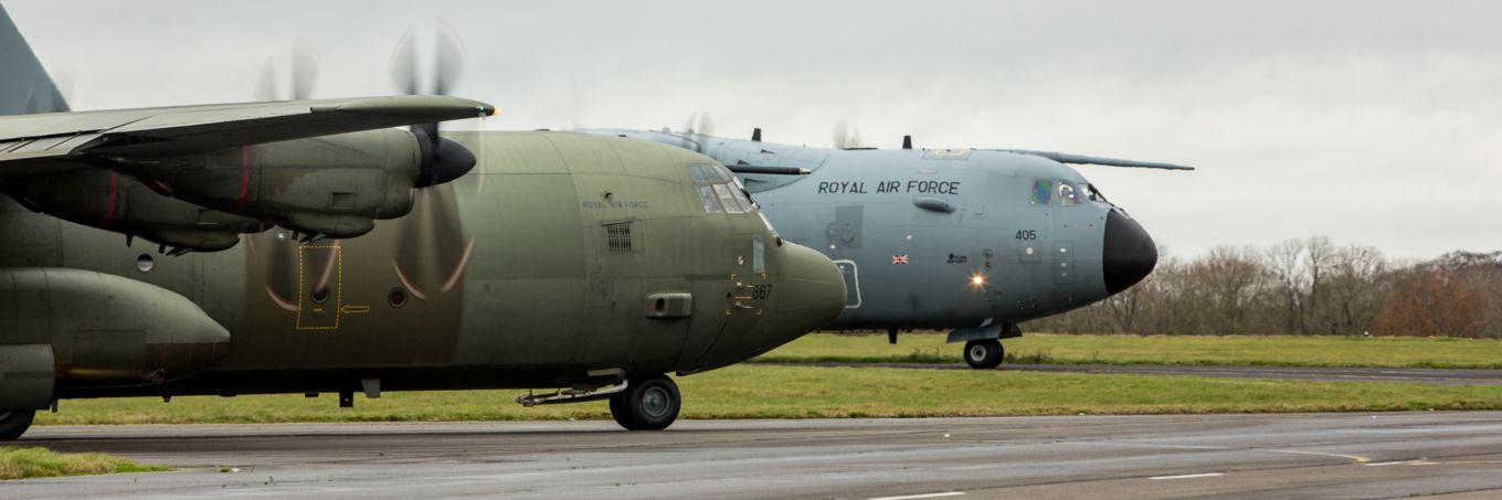 From left to right: An RAF C130 Hercules and an A400M Atlas at RAF Wittering