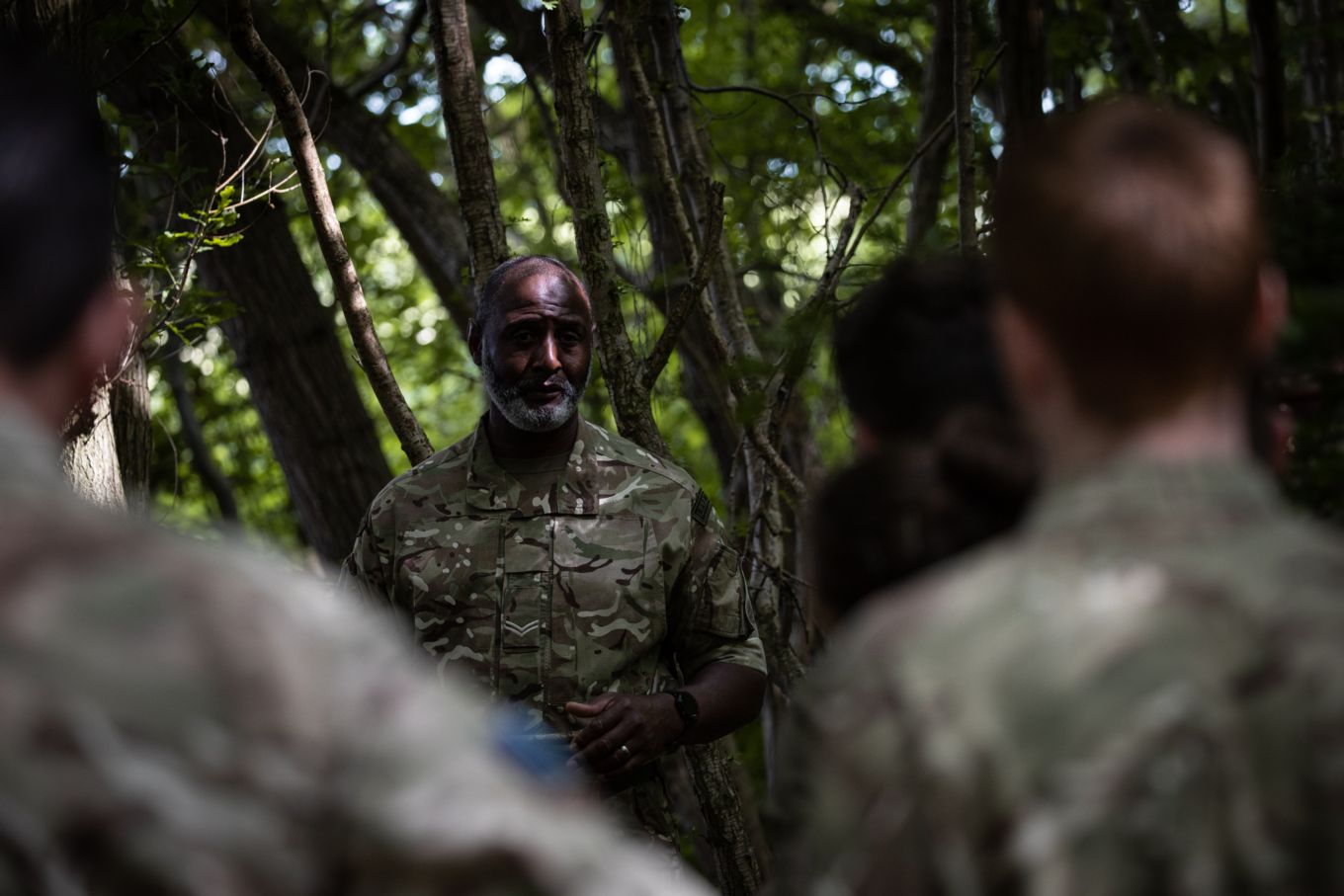 Cpl Errol Robinson from No 504 (County of Nottingham) Squadron teaching fieldcraft skills at RAF Wittering during phase one of the exercise