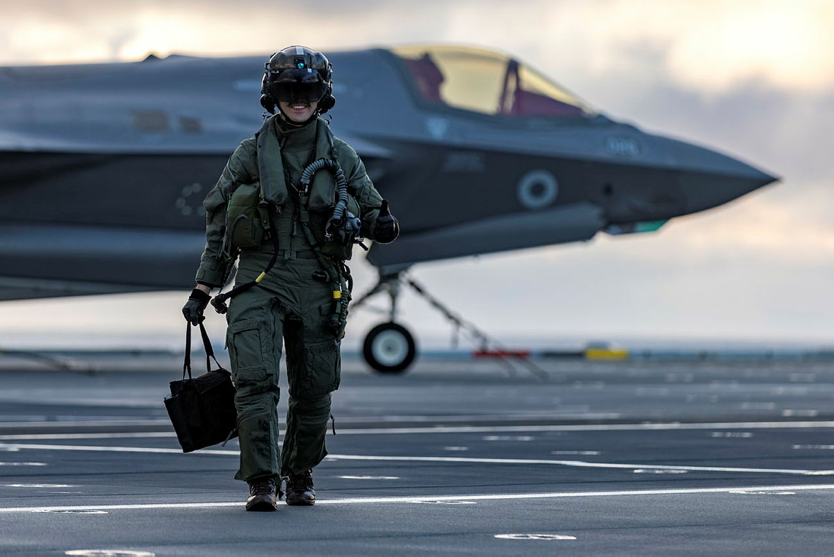 F35 pilot gives the thumbs up as they walk form a succesful landing on the QE aircraft carrier