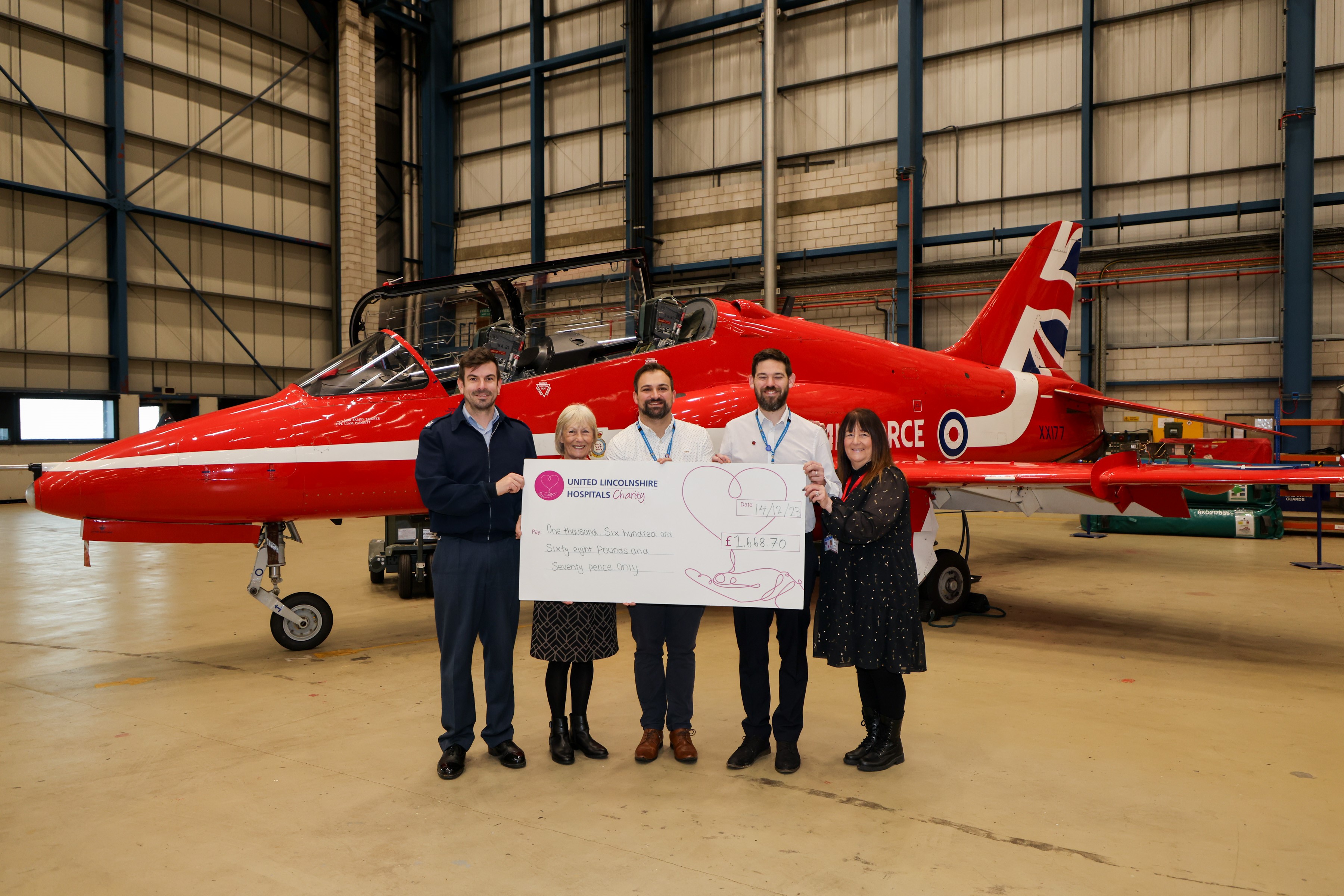 Ch Tech Pearson (left) with hospital staff on a visit to the Red Arrows.
