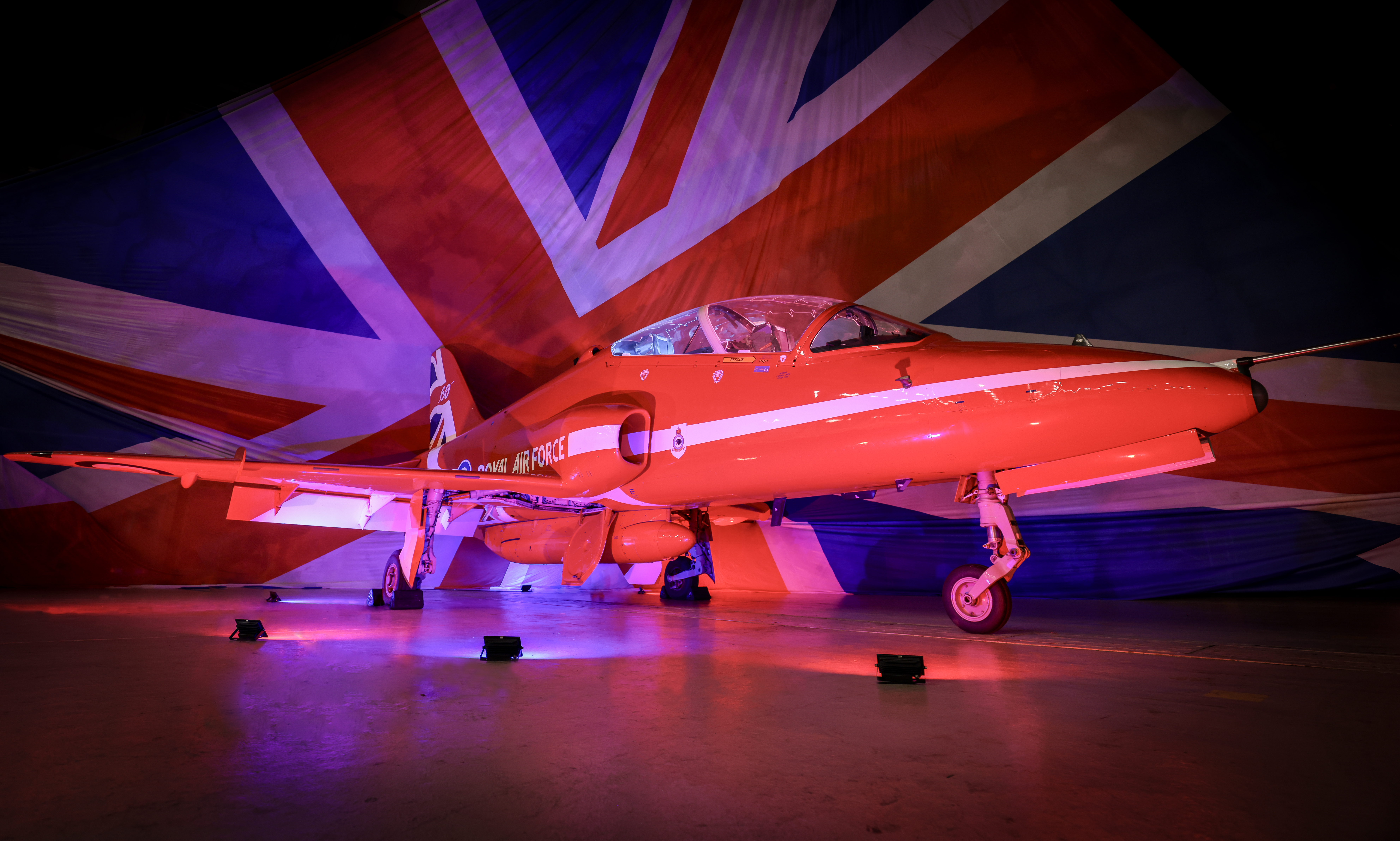 A Red Arrows Hawk jet, at RAF Waddington, with the 60th Diamond Season artwork applied.