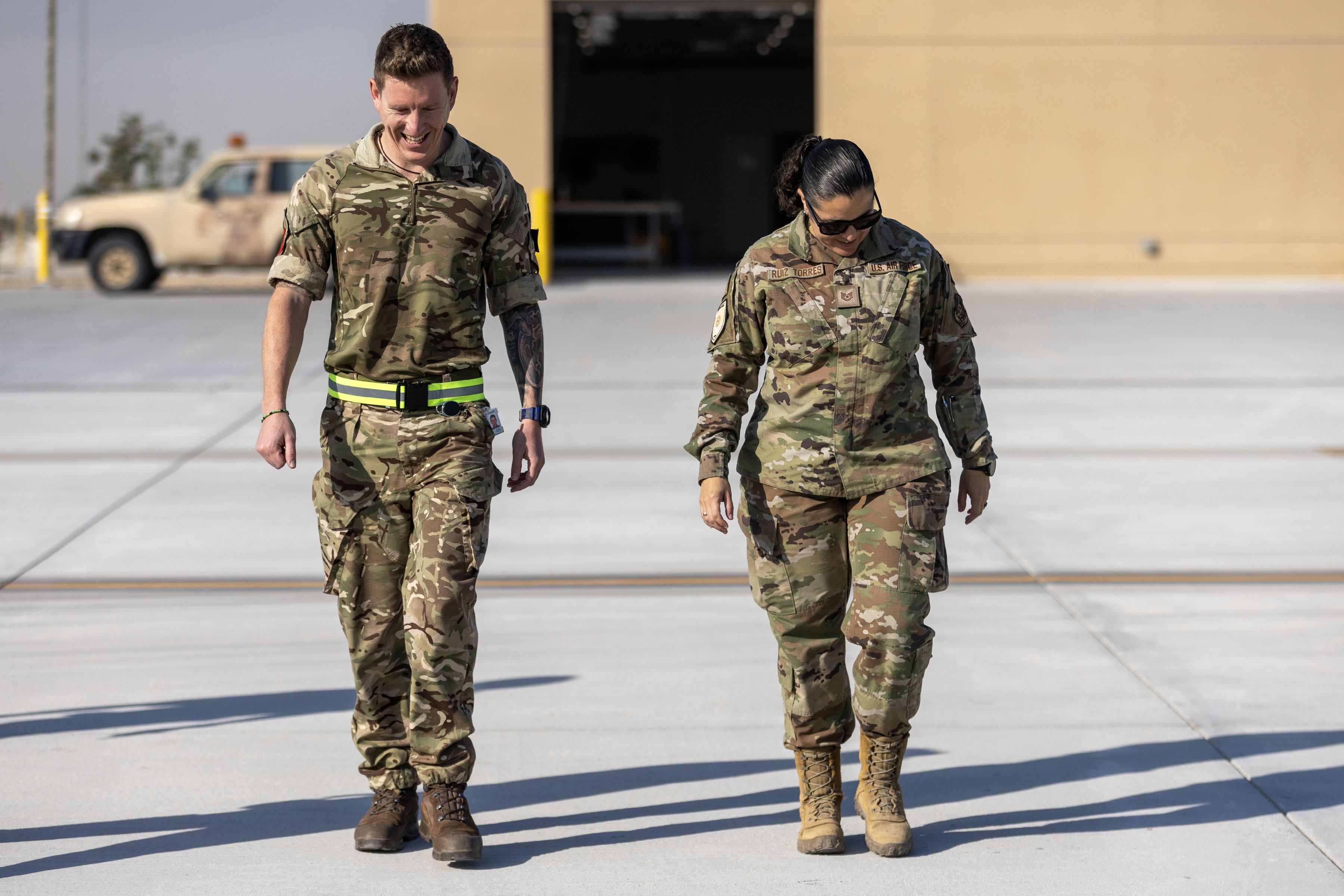 Two servicepeople walking together