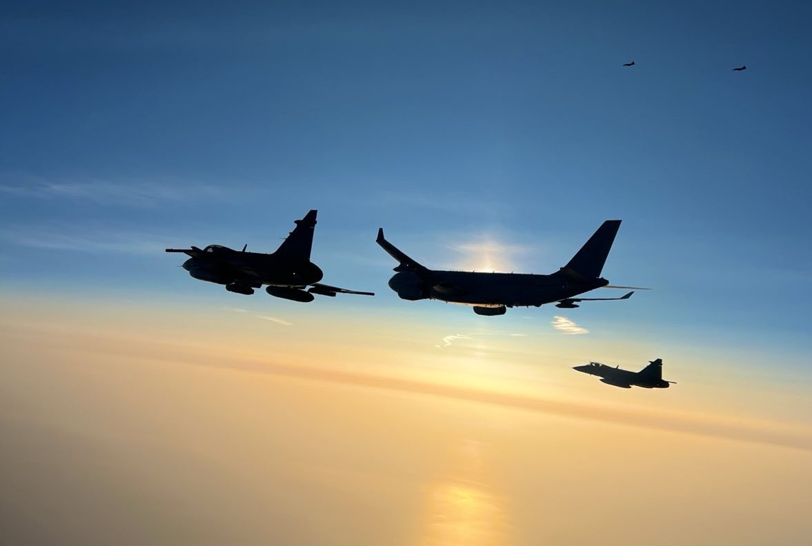 Silhouettes of the aircraft flying