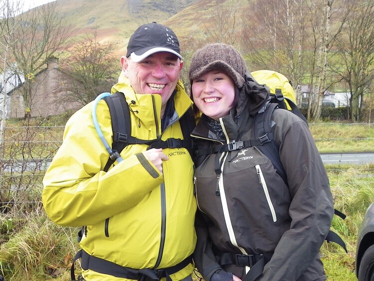 Sophie and Andy in hiking gear.