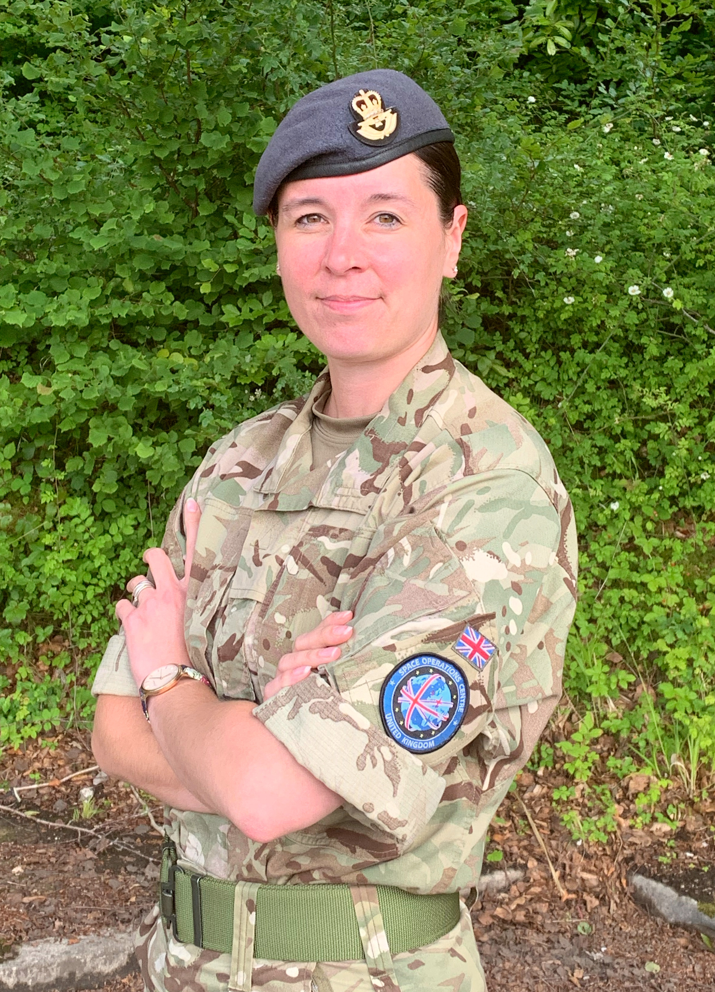 Portrait of personnel outside.