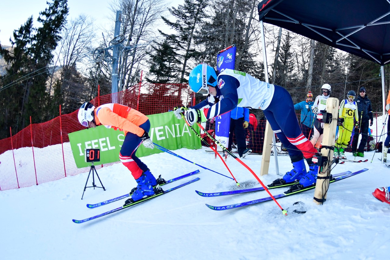 Skiers leaving the start blocks.