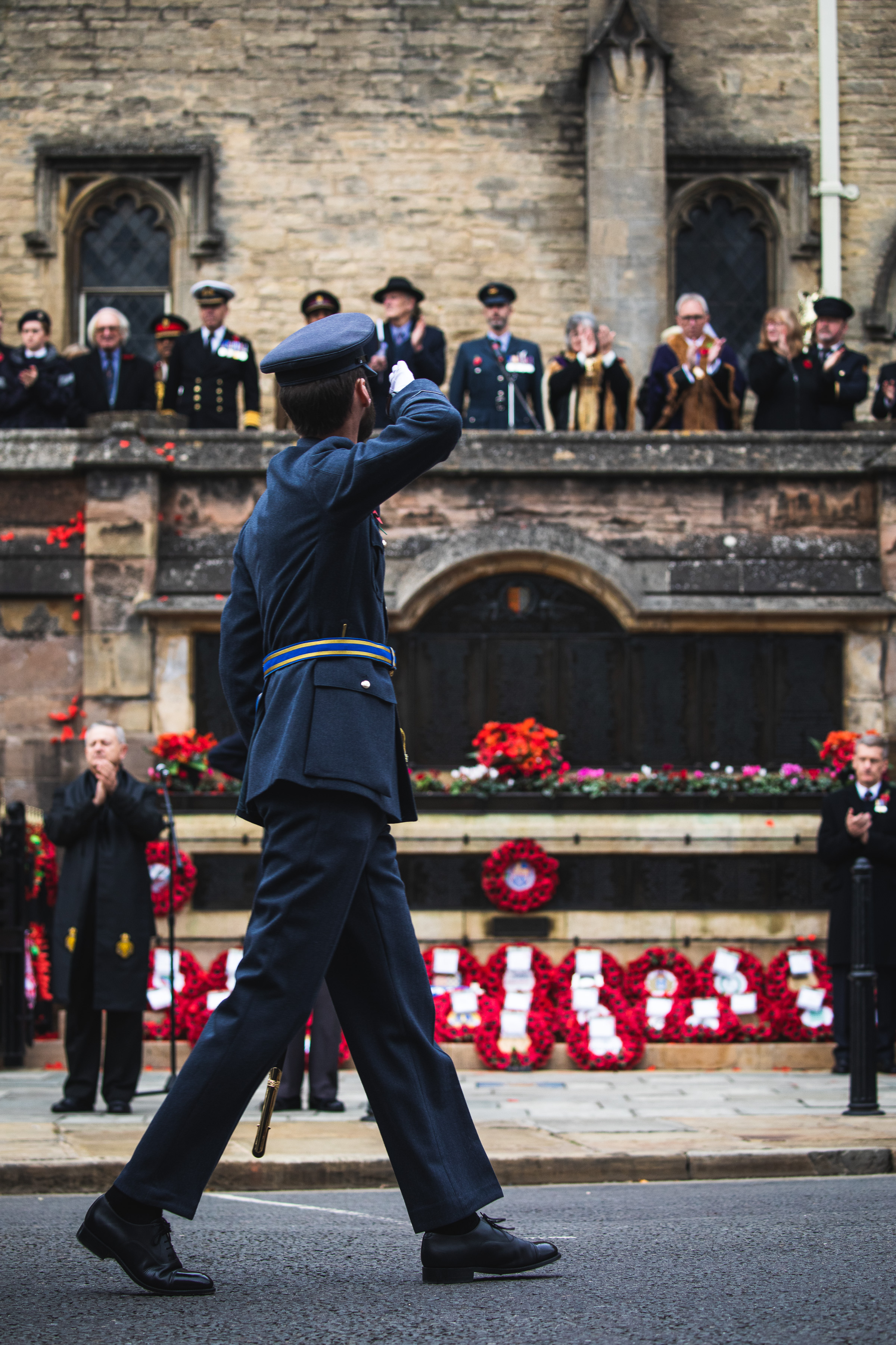 A salute is given as the parade passes the war memorial at Browne’s Hospital
