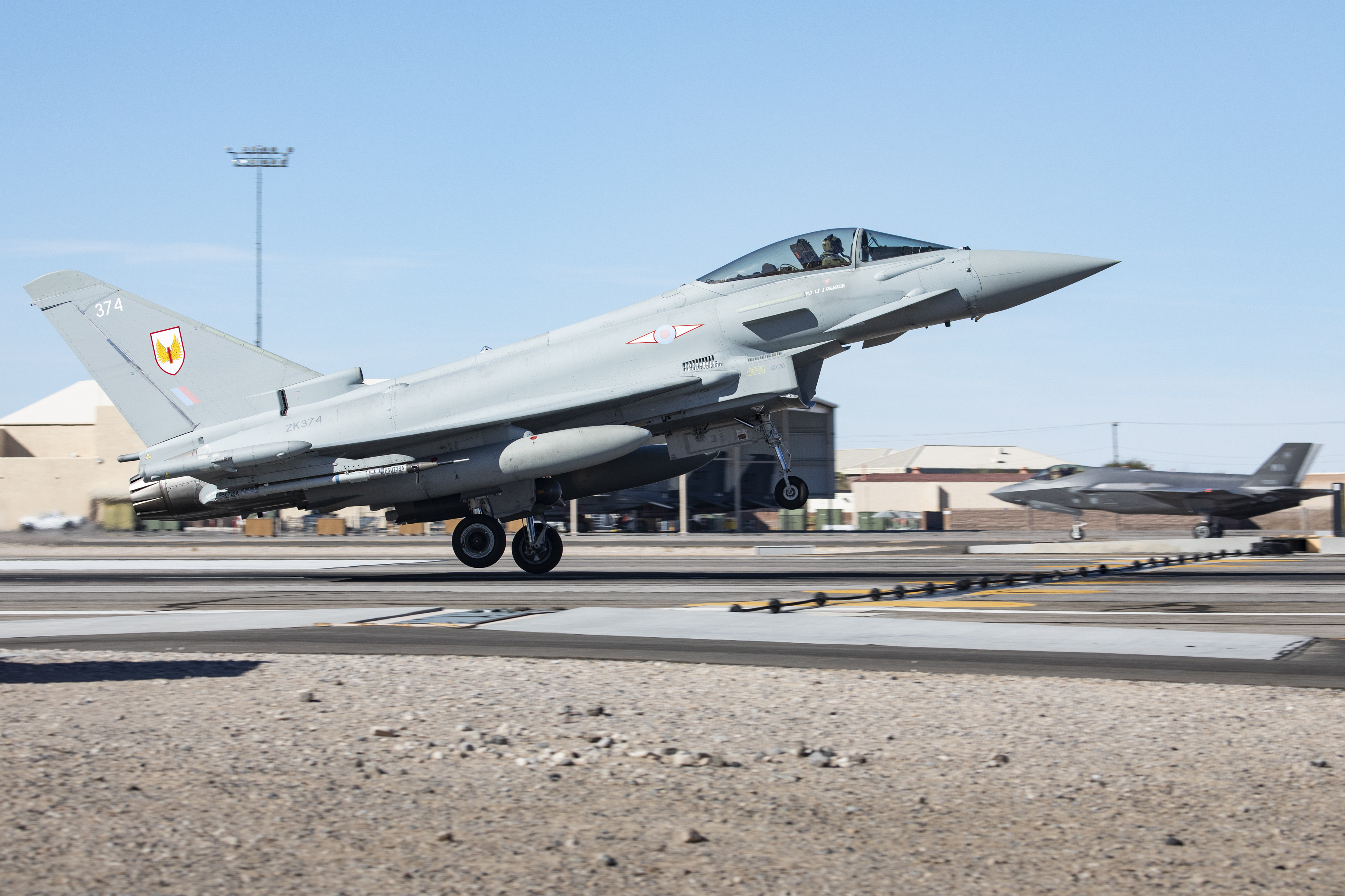A United States Air Force F-35 A jet taking off.