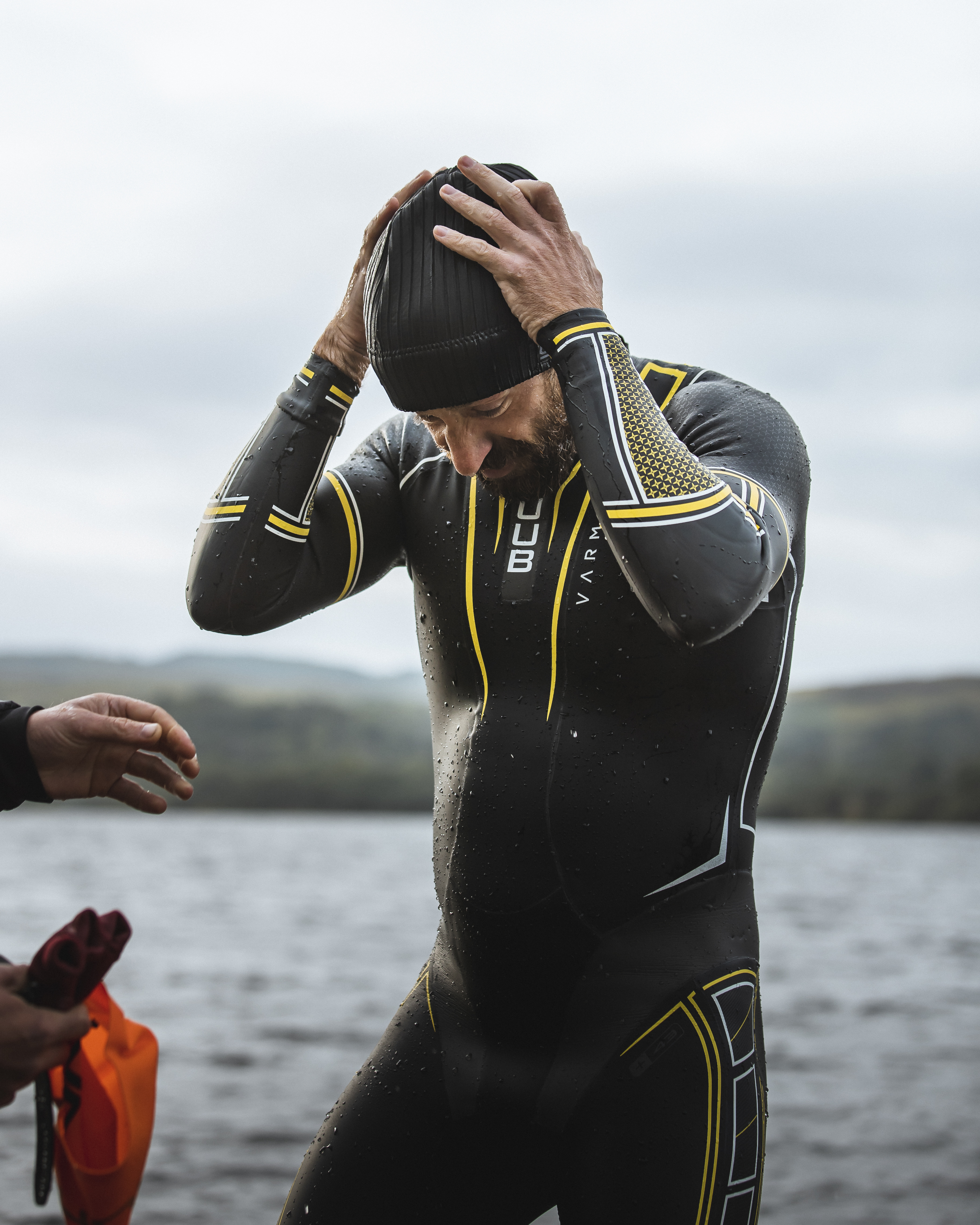 Frankie wears wetsuit.