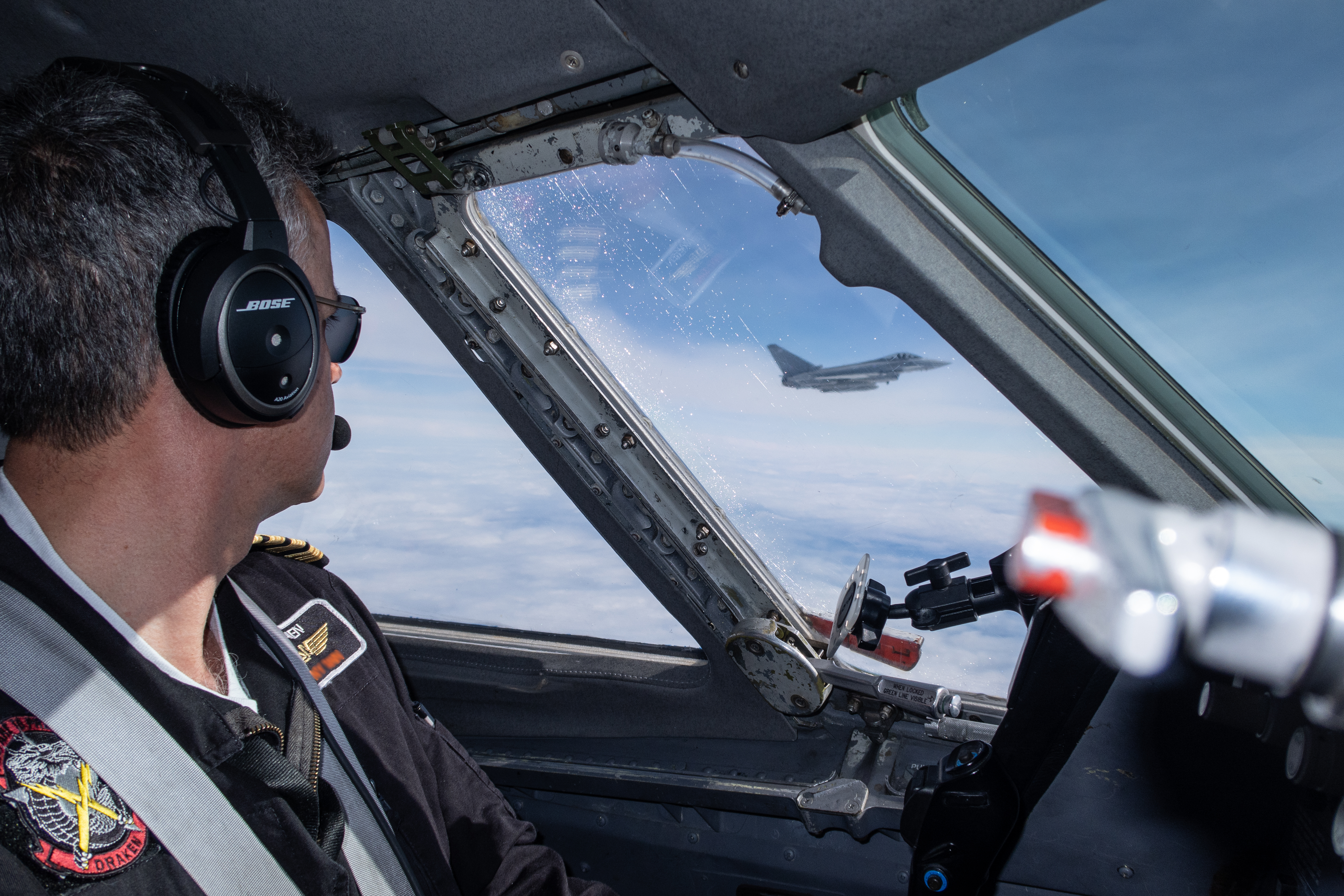 Pilot looks out of Typhoon cockpit to another Typhoon.
