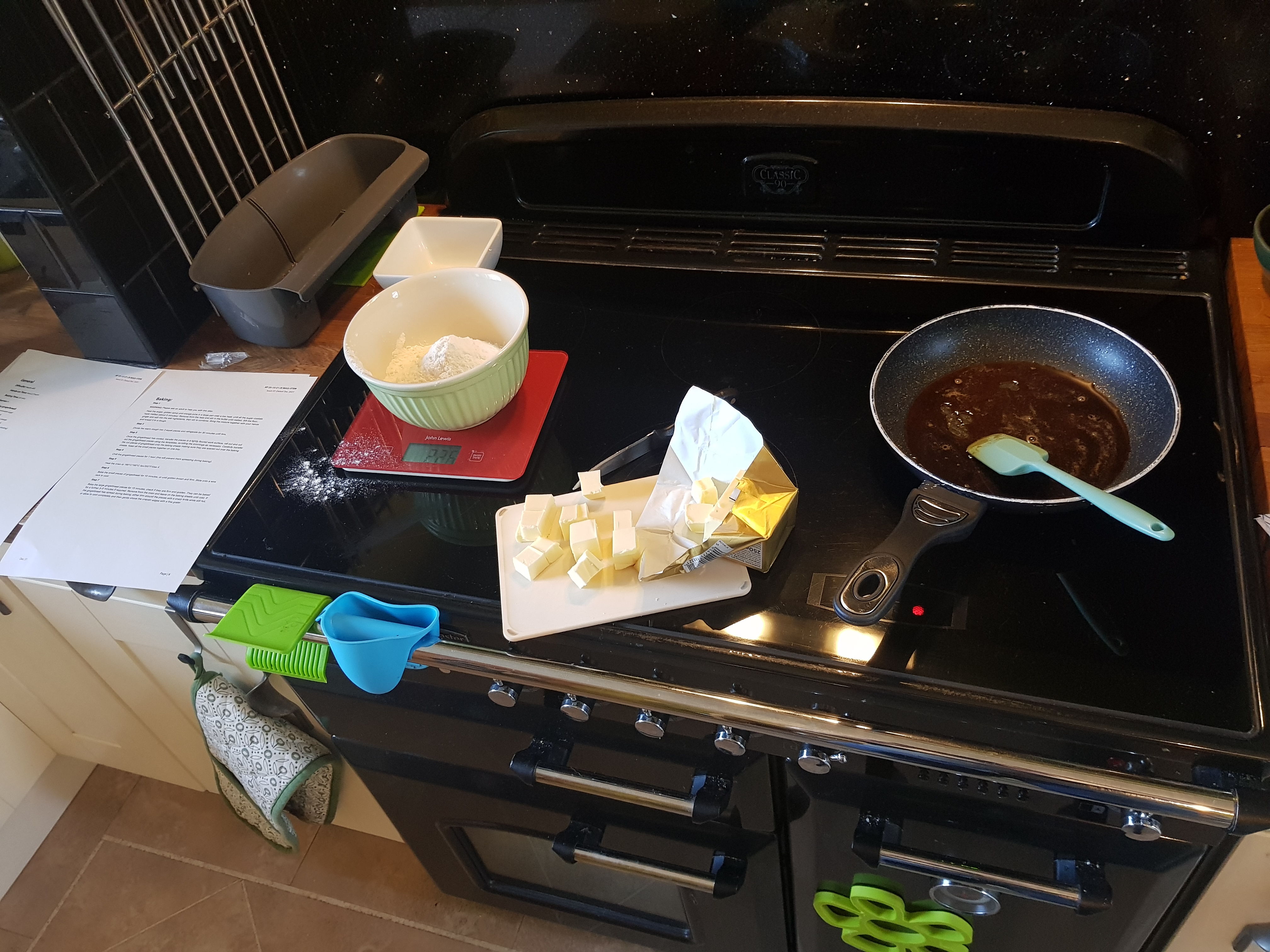 Making gingerbread on the stove, melting the chocolate and butter.
