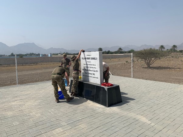 Personnel clean memorial.
