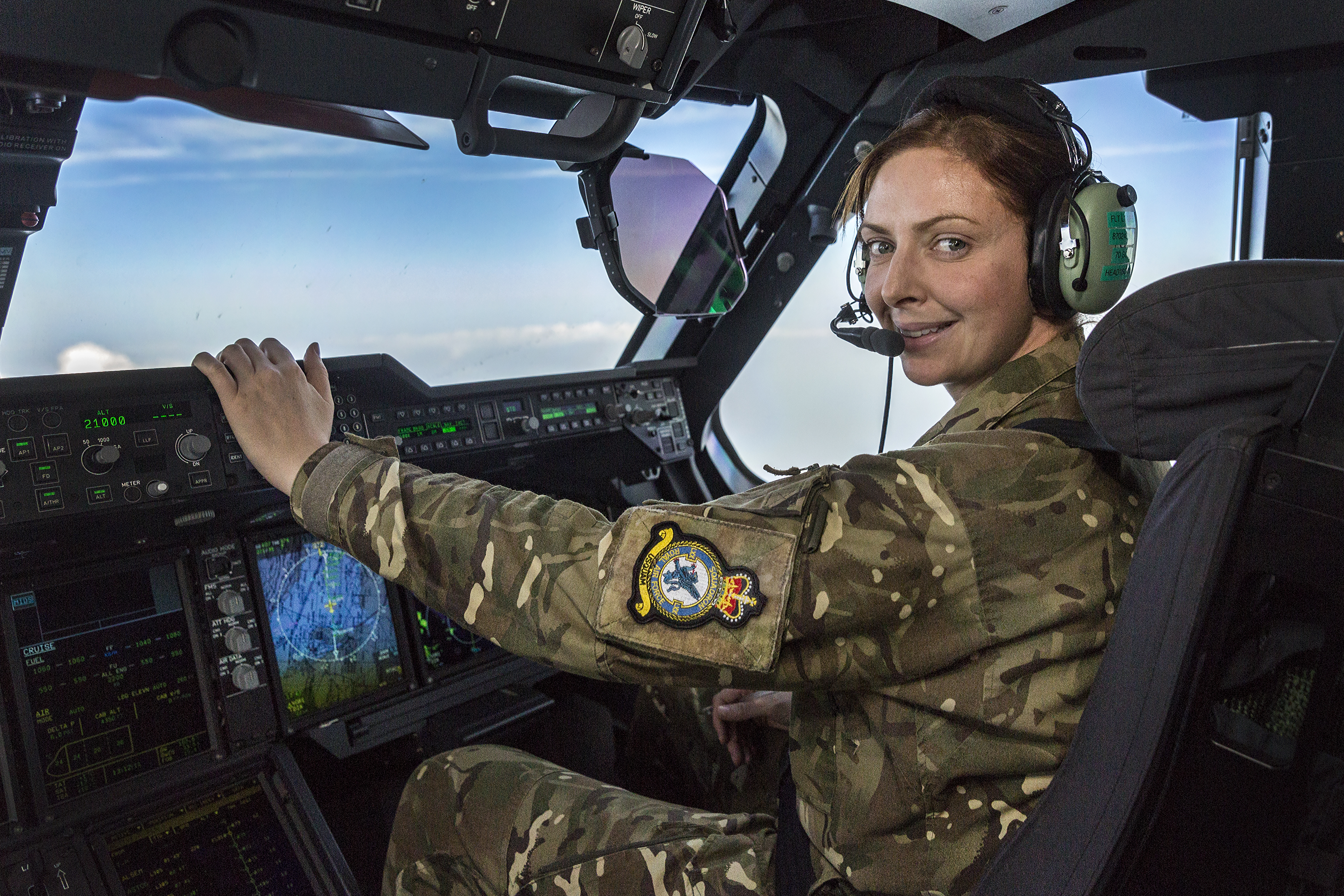 Image shows RAF aviator in cockpit of carrier aircraft.