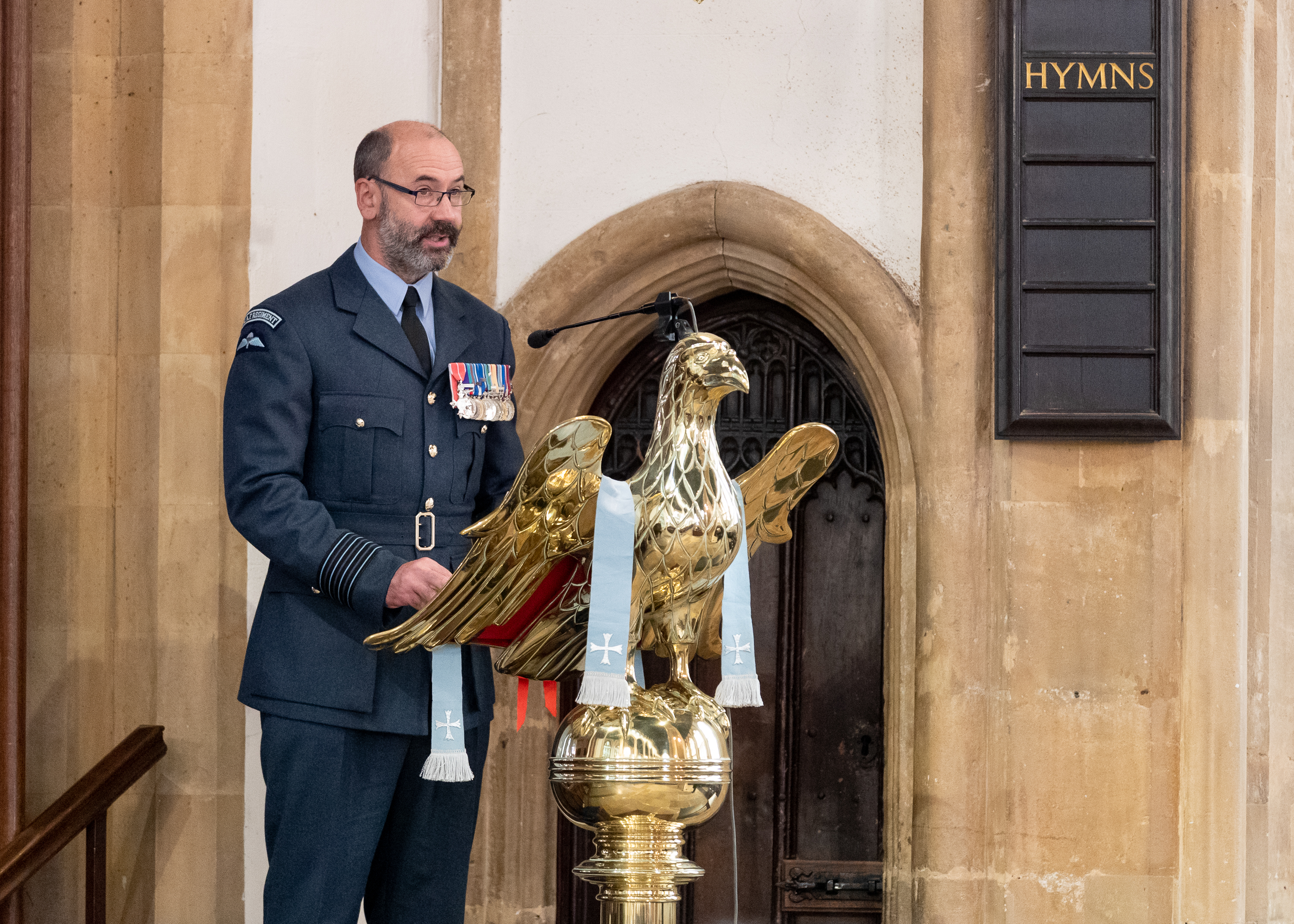Personnel stands at Eagle oration stand.