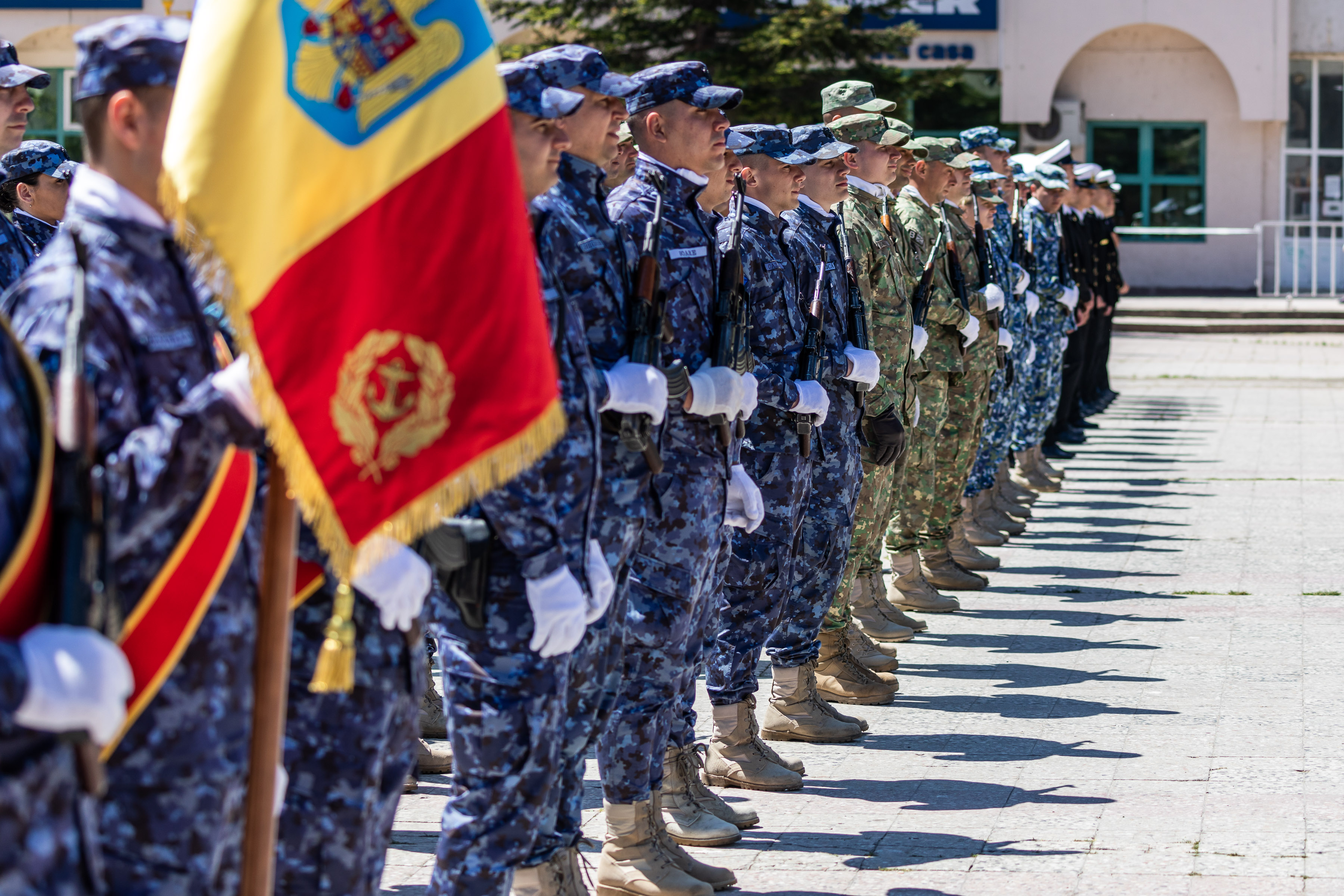 Romanian Personnel during parade, with Flag Colour.