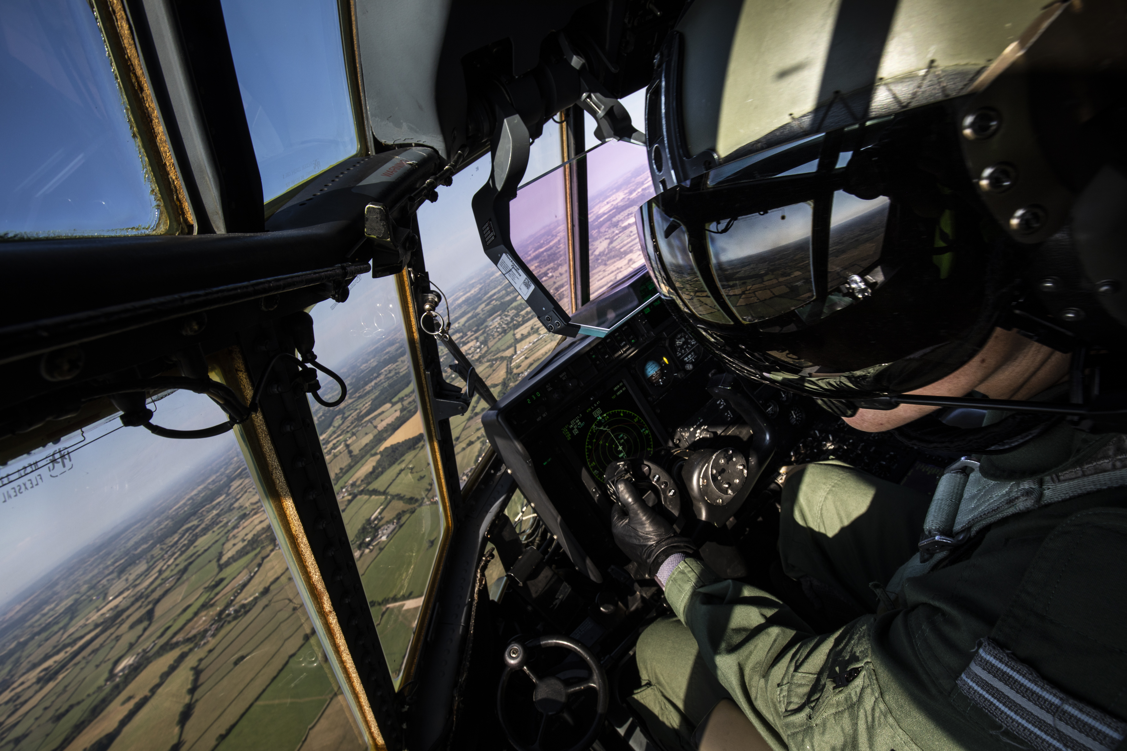 Image shows RAF aviator in the cockpit of a Typhoon in flight.