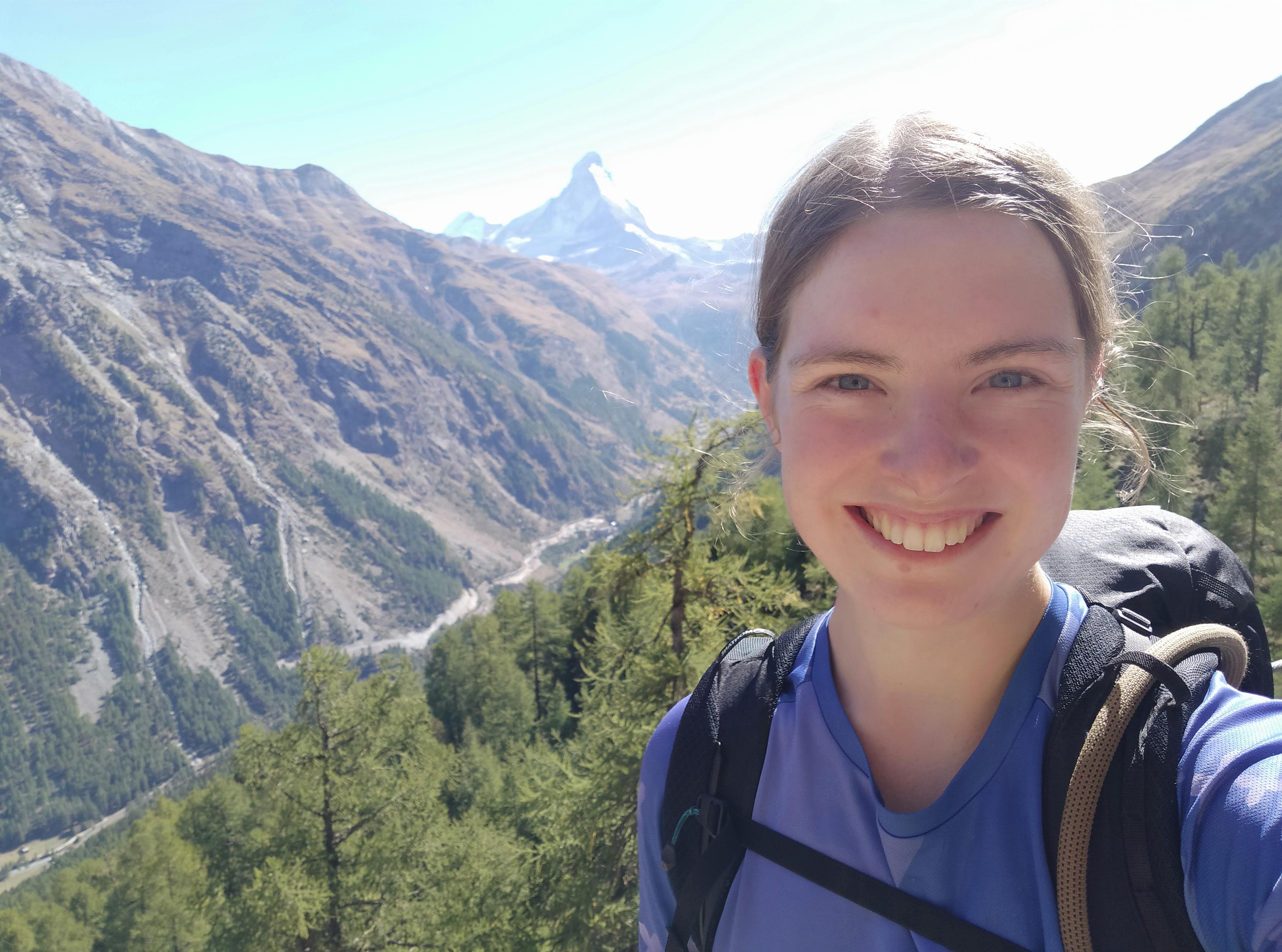 Selfie of Clare Ballantyne in front of a mountain range