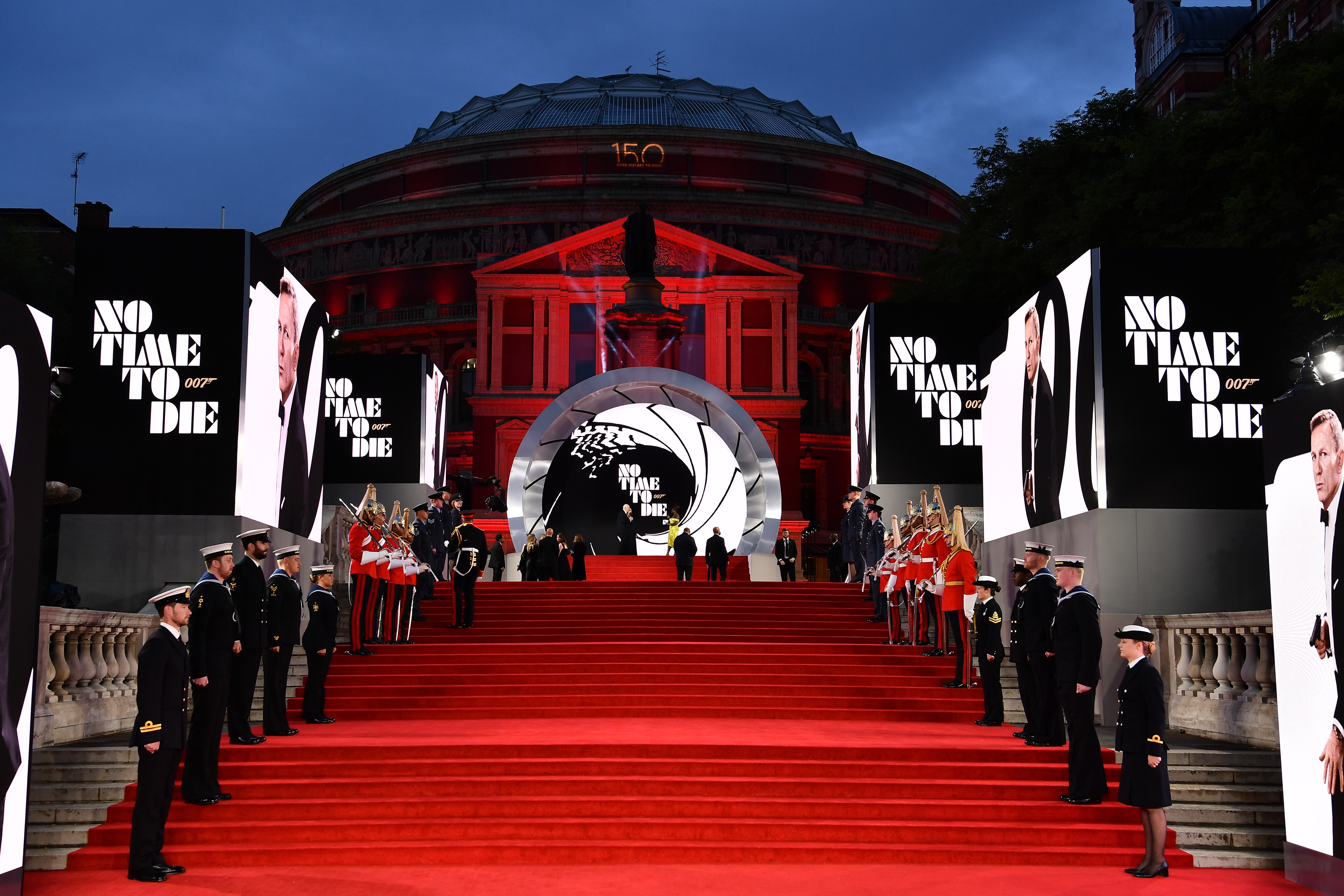 The Duchess of Cambridge on the red carpet, with Royal Navy and Household Cavalry personnel.