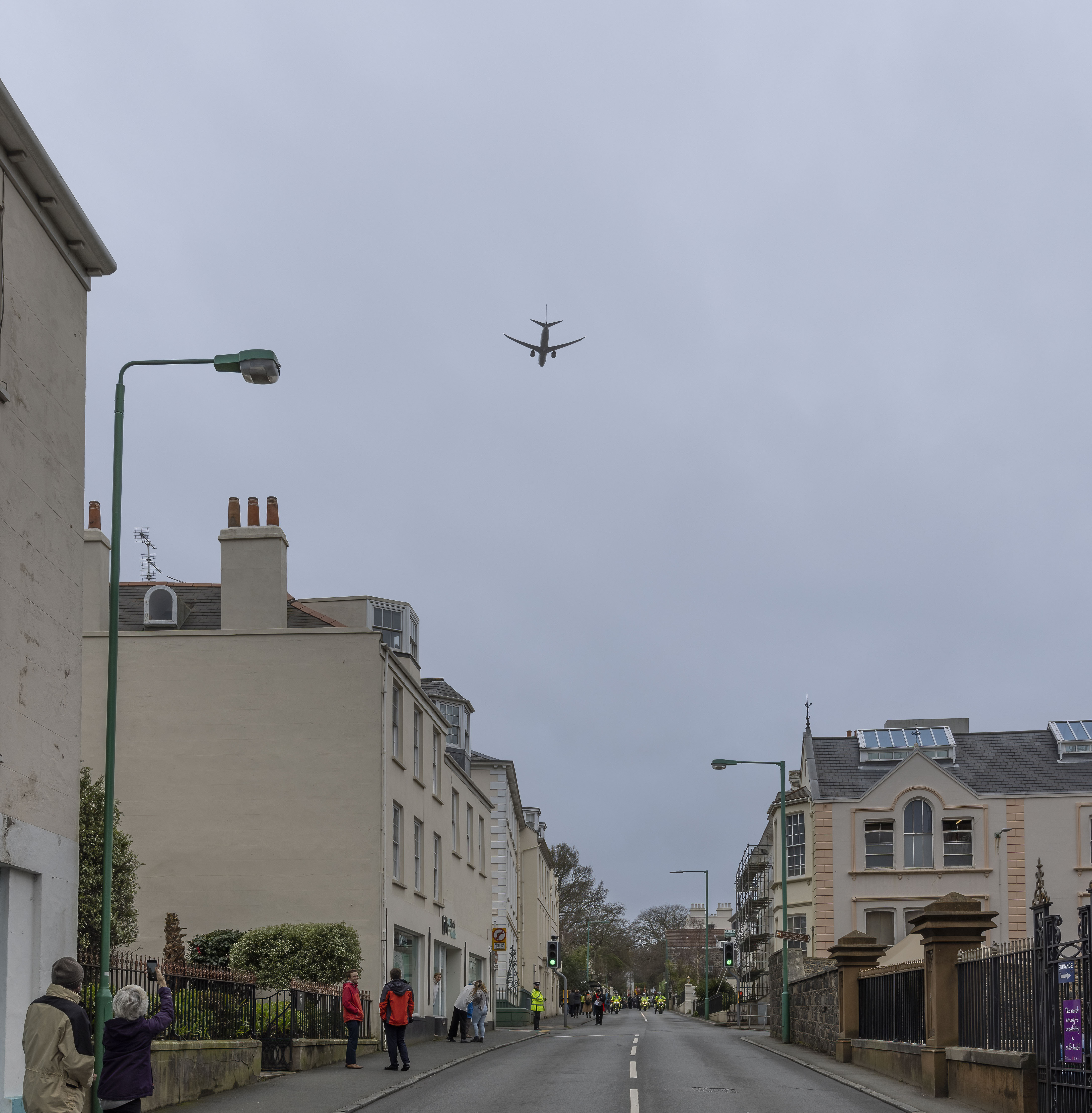 Poseidon flypast over village.