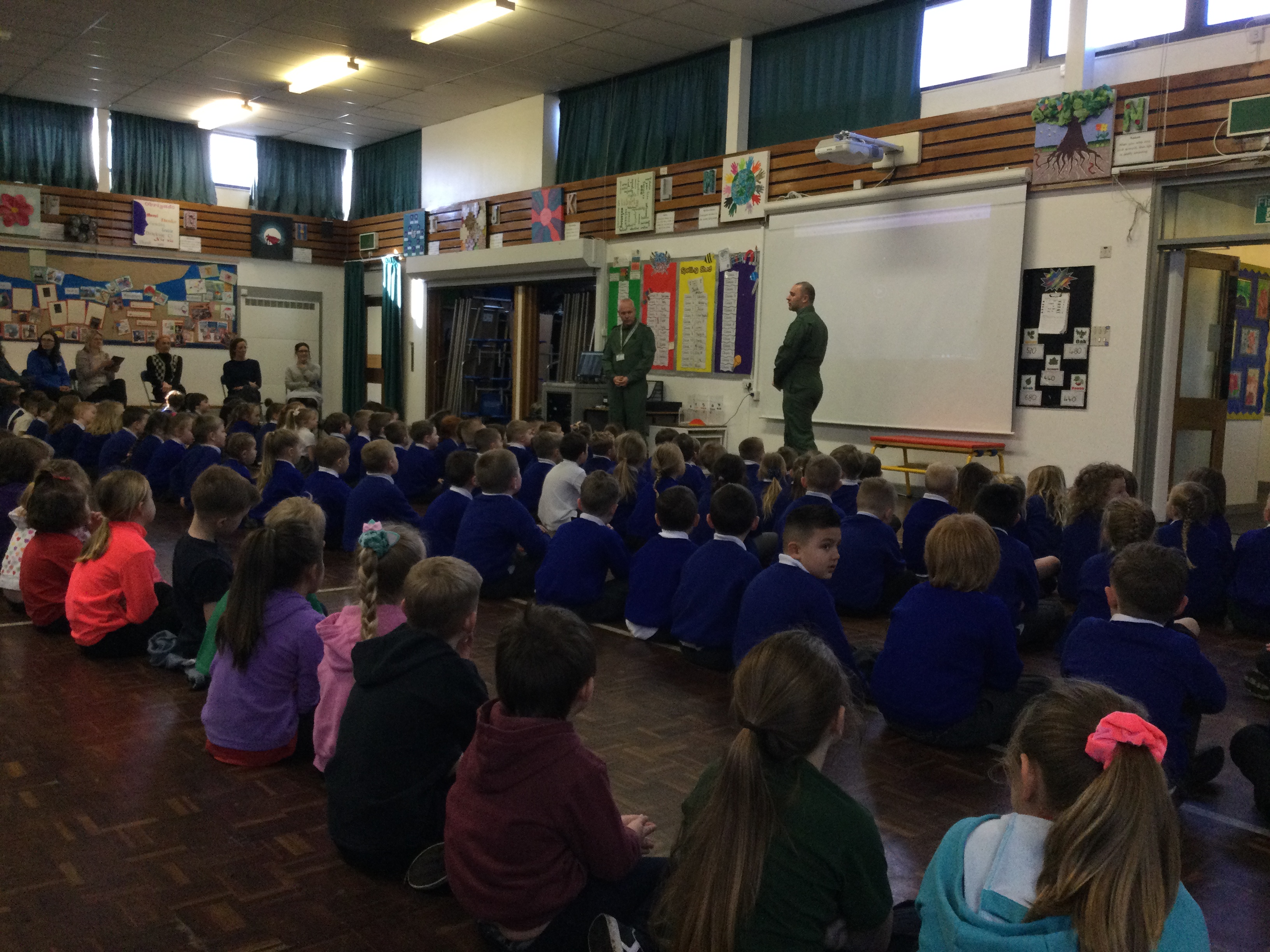 RAF Personnel present to school children in school hall.