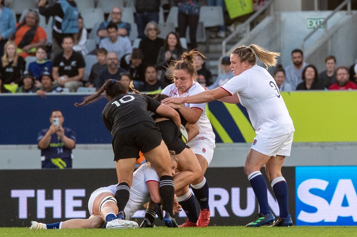 Image shows two rugby teams playing.