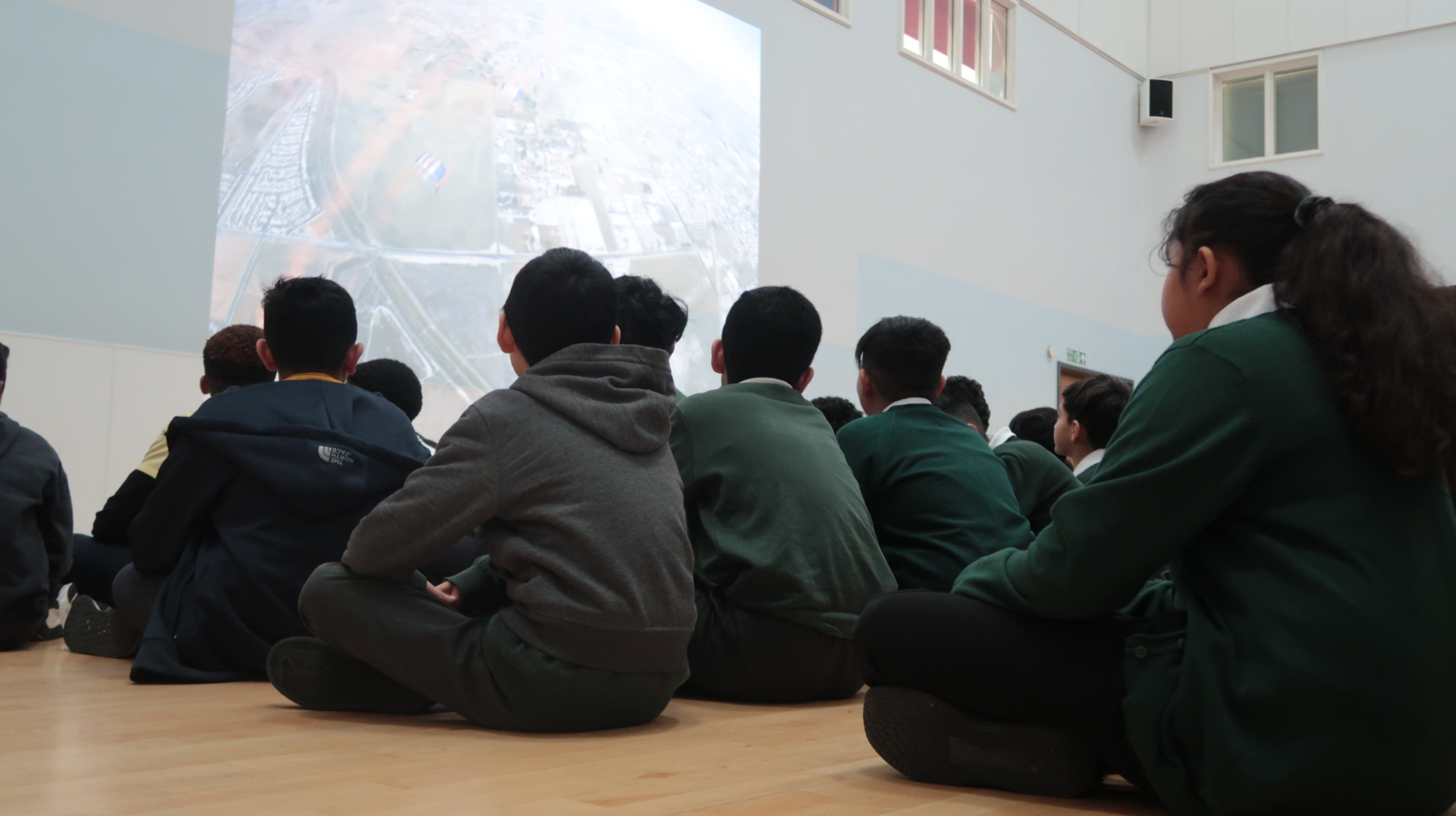 Members of the Royal Air Force Falcons Parachute Display Team have visited a primary school in the West Midlands during a break in their display training.