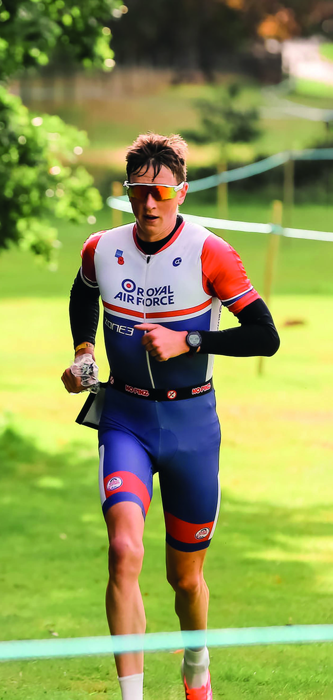 Image shows RAF aviator running.