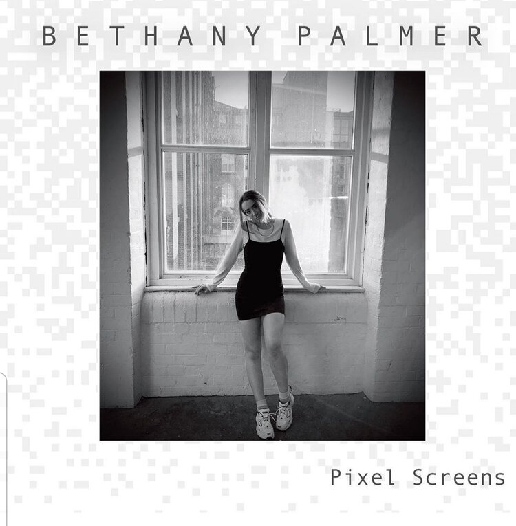Album cover of Beth posing by a window.