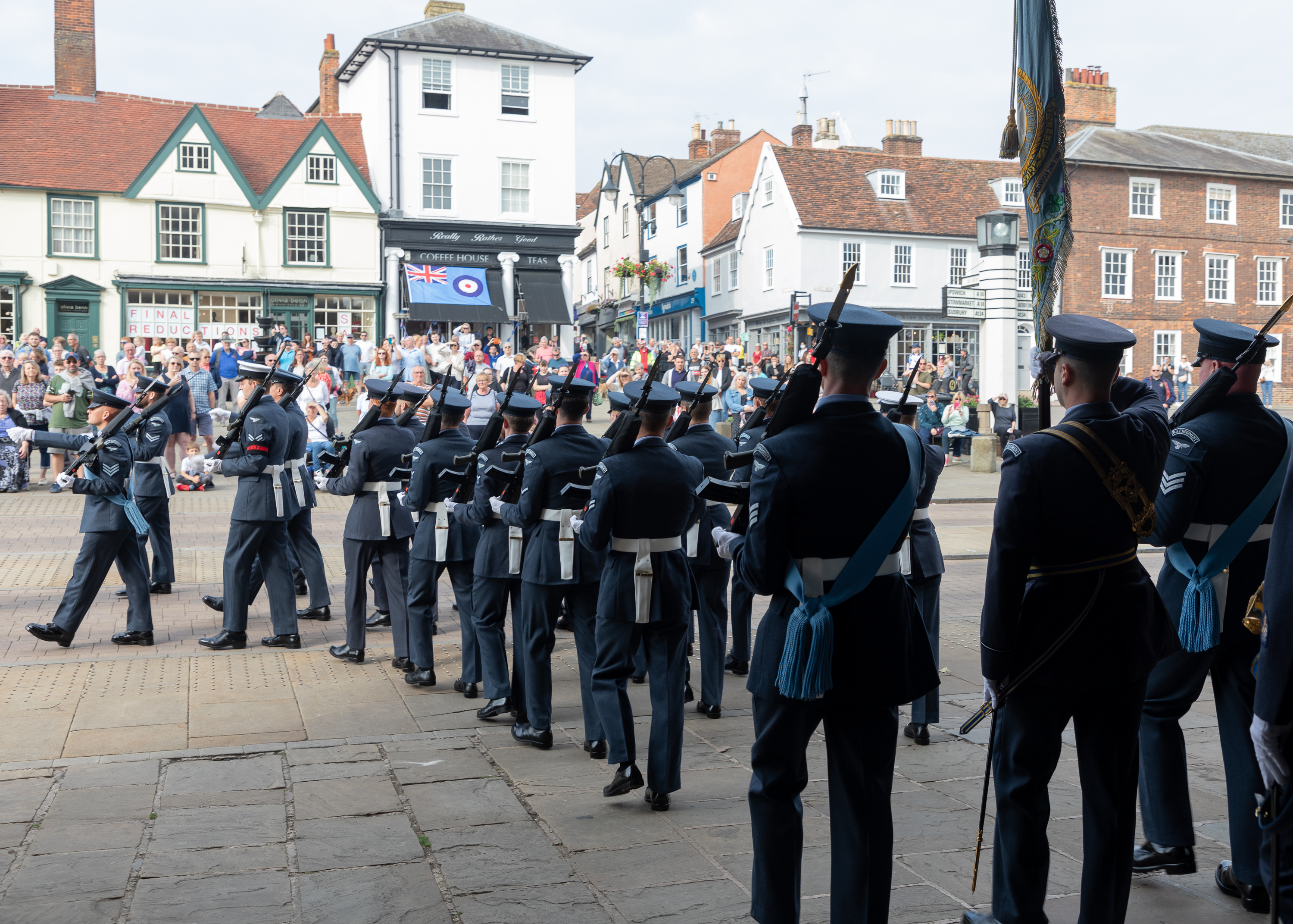 Personnel parade in town square.