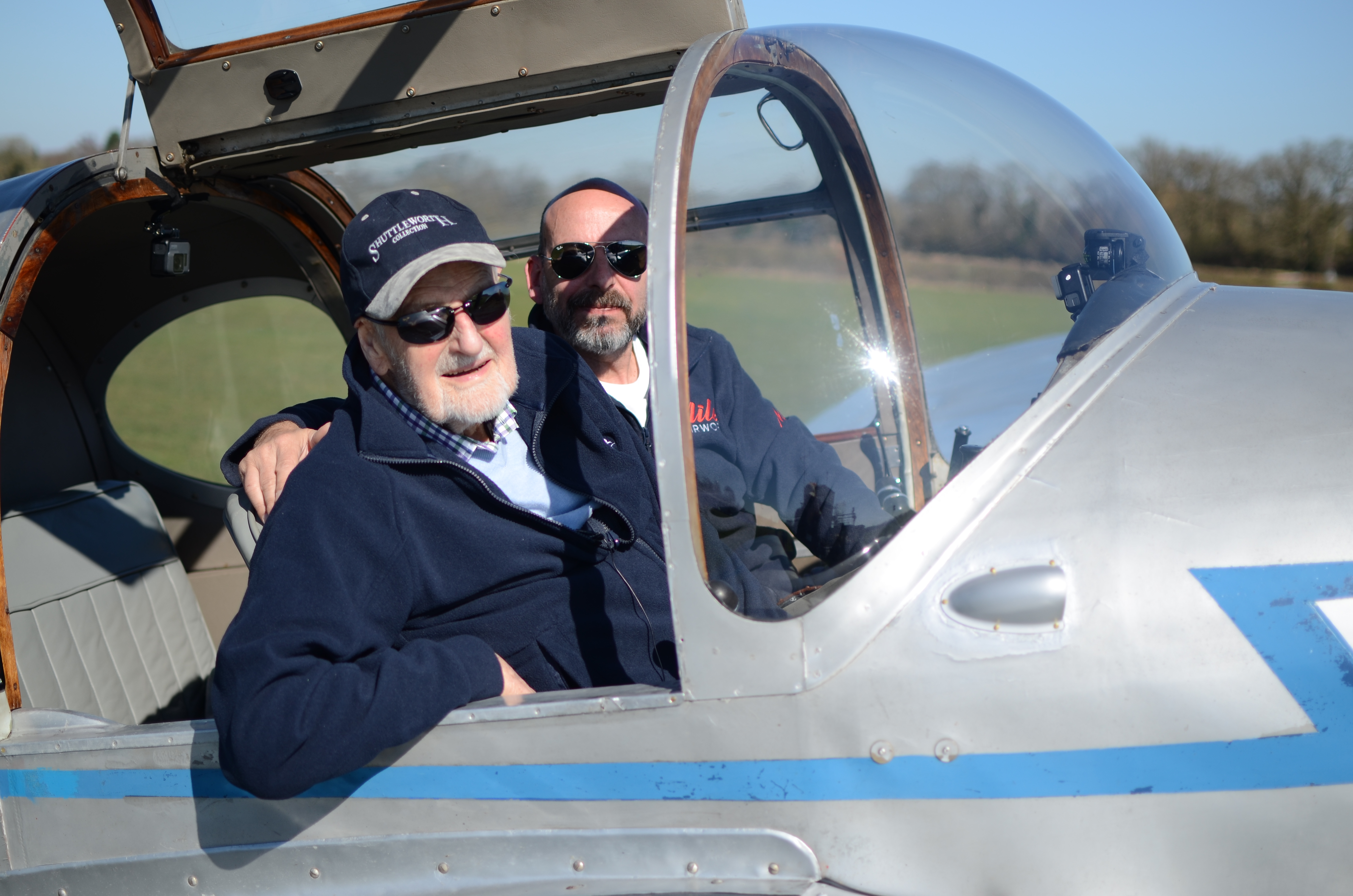 Jack and Stuart inside Gemini aircraft on the ground.