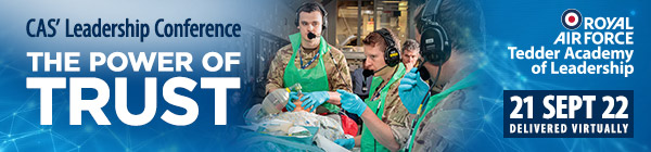 Banner for the Conference 2022, featuring a medical team working with a patient.
