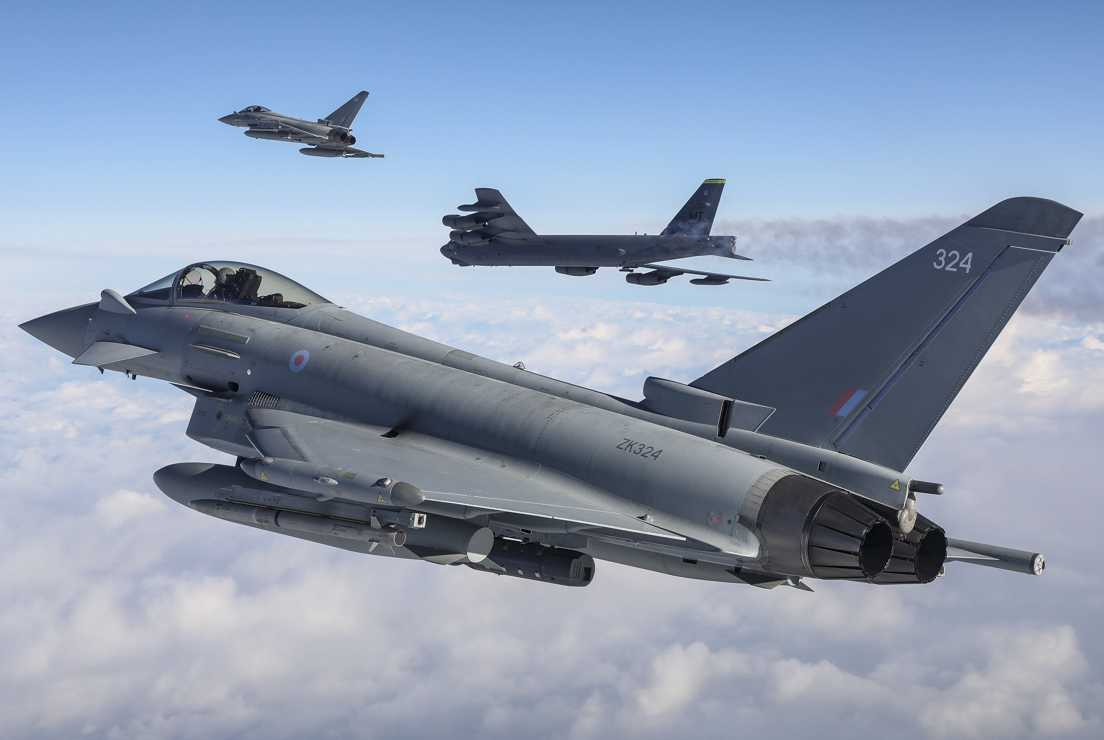RAF Lightning jets in flight with US B-52.
