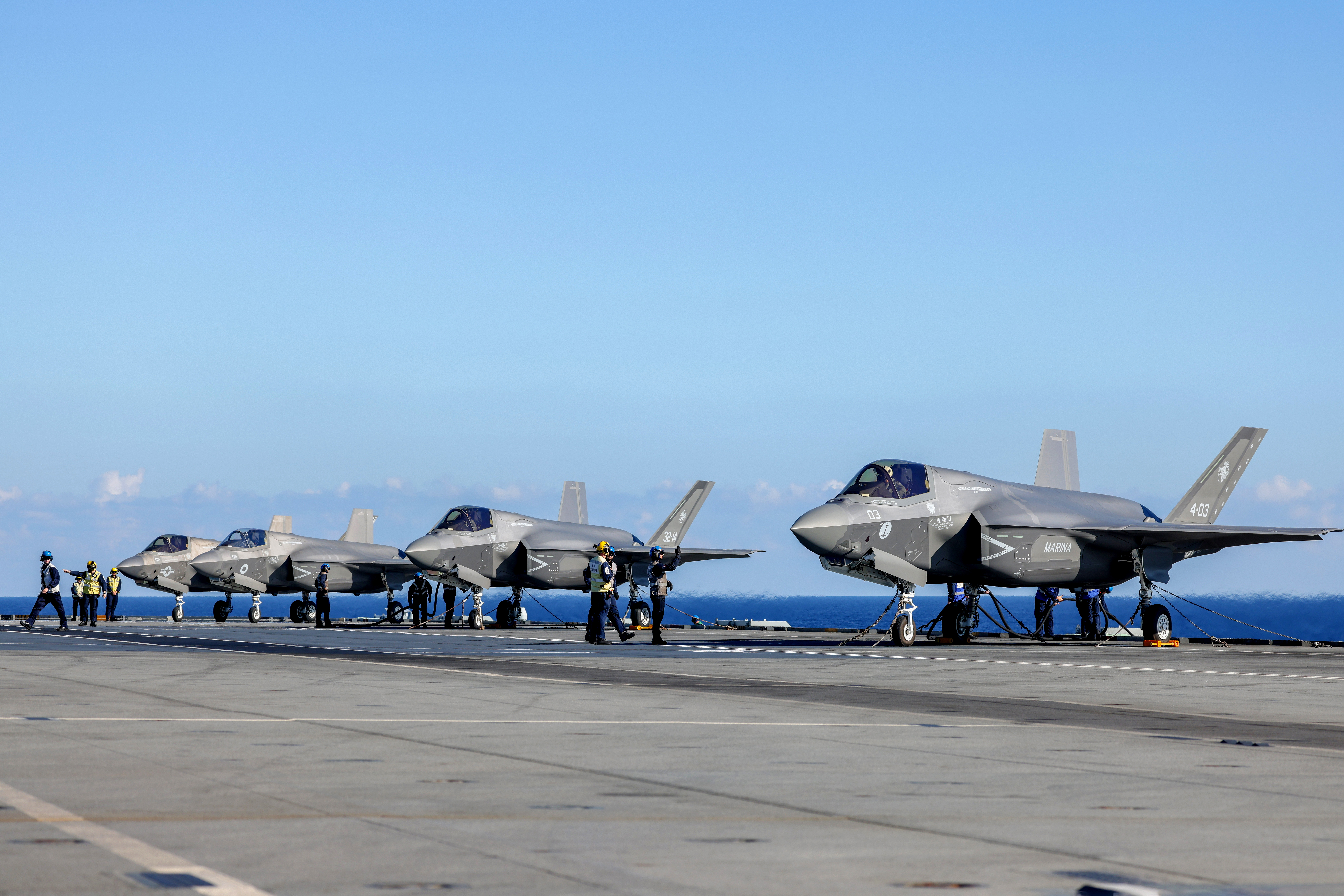 Aircraft lined up on the carrier.
