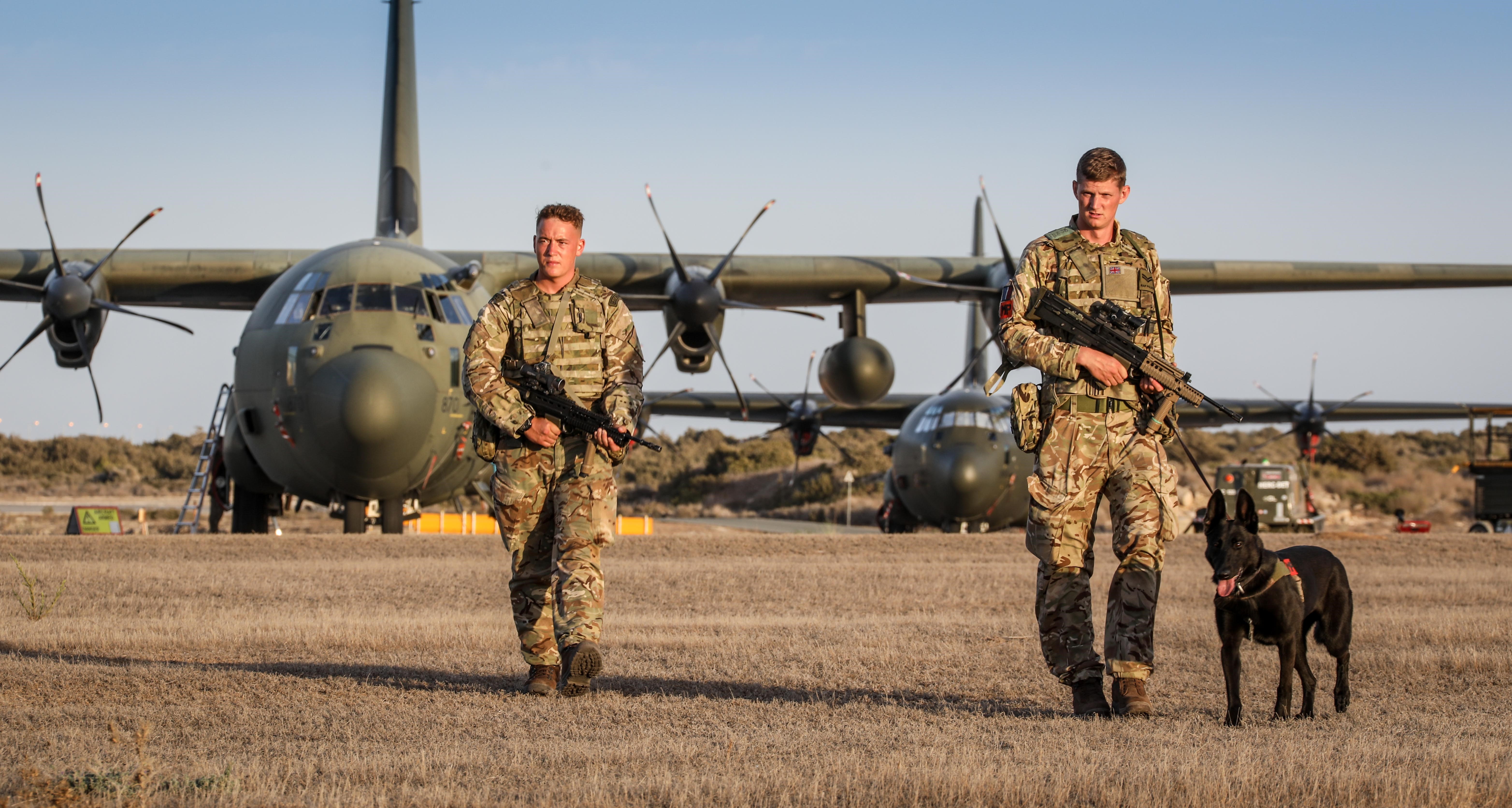 Image shows drones and surveillance equipment, with RAF Regiment holding their rifles.