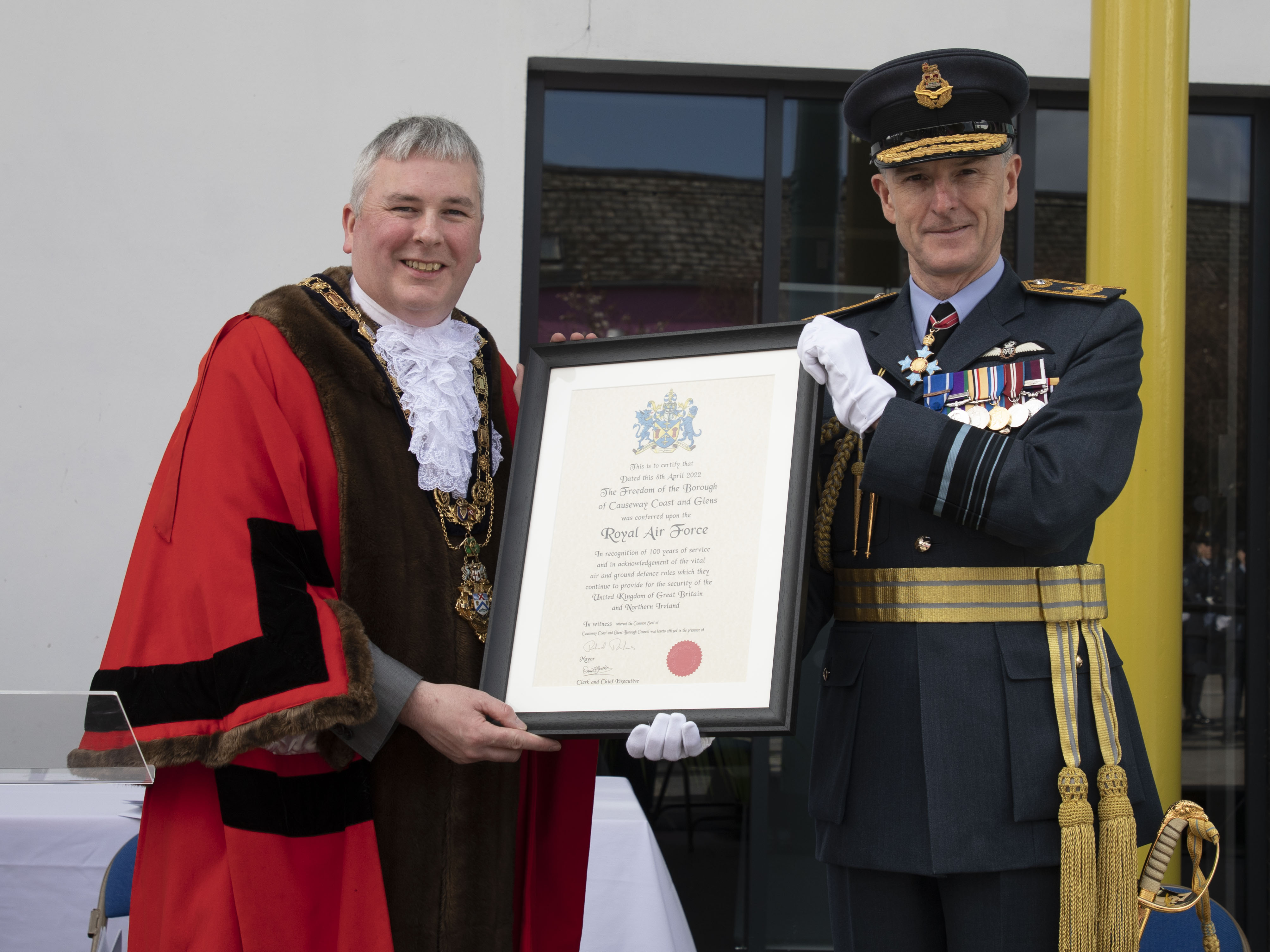 Councillor and Air Marshal Richard Holmes hold Ceremonial Certificate.