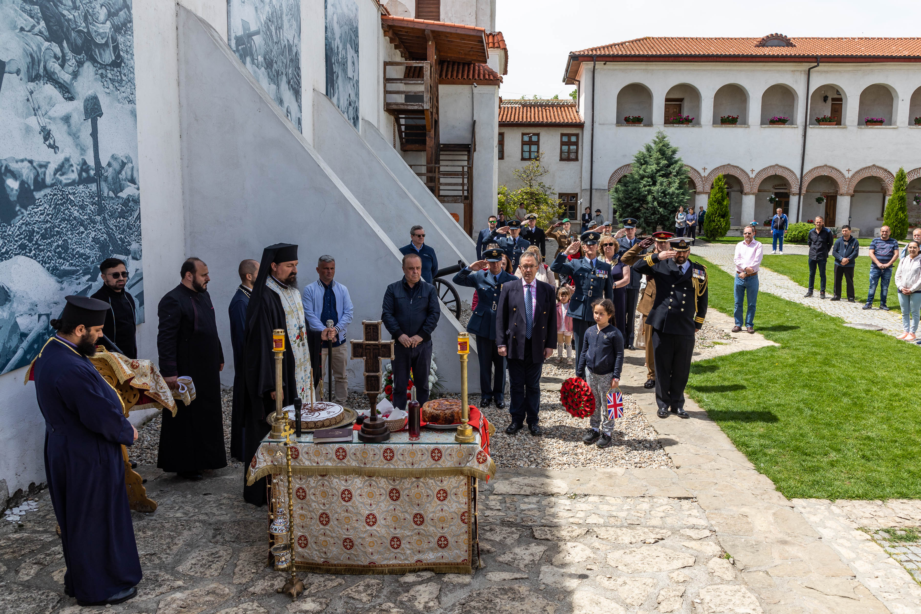 Personnel and locals during ceremony.