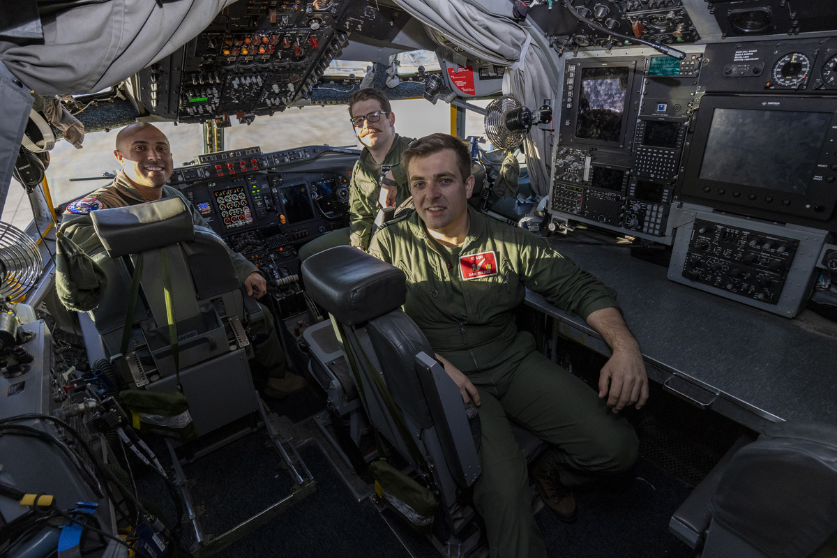 Image shows aircrew inside the cockpit of a Rivet Joint aircraft.